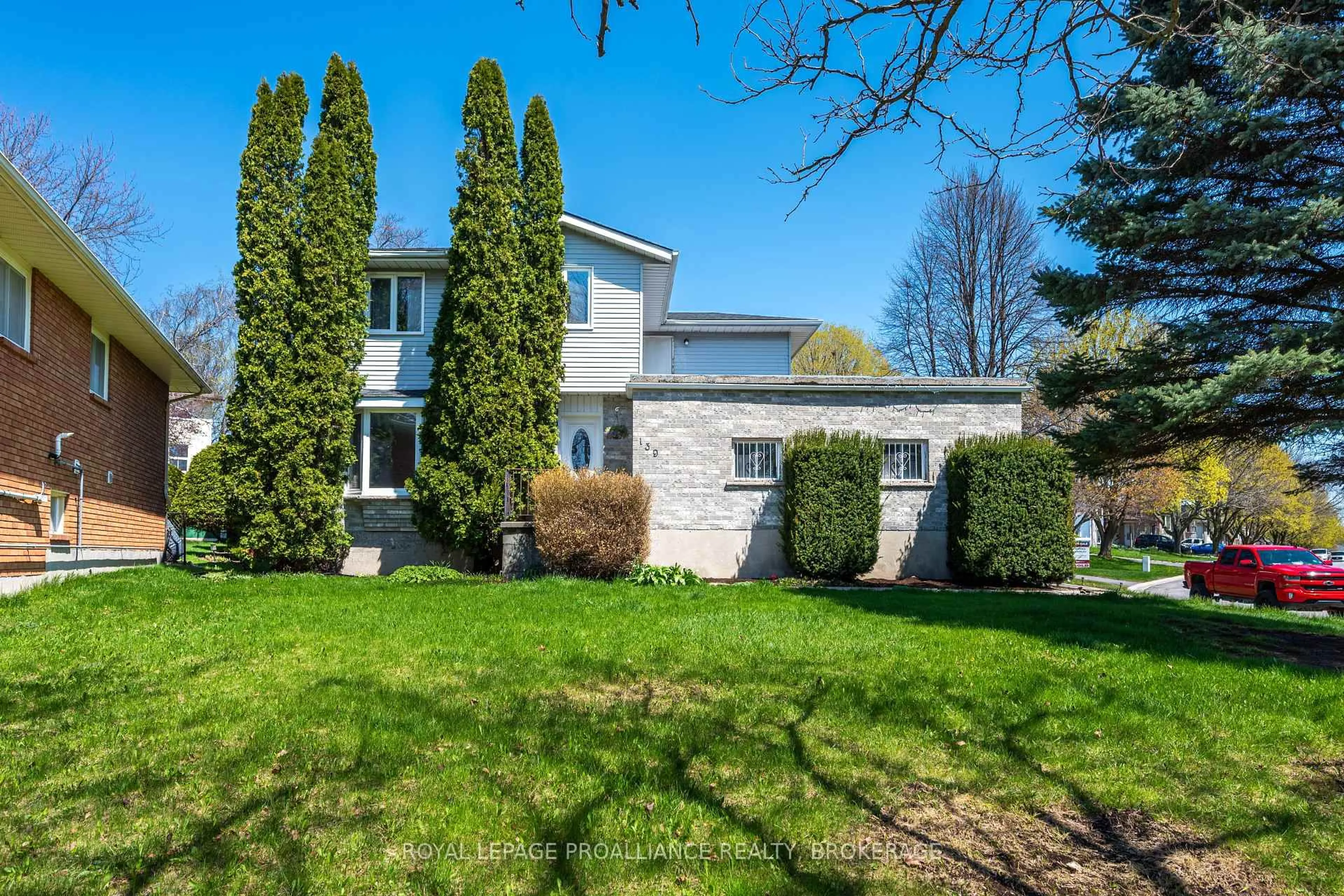 A pic from outside/outdoor area/front of a property/back of a property/a pic from drone, street for 139 Dauphin Ave, Kingston Ontario K7K 6W3