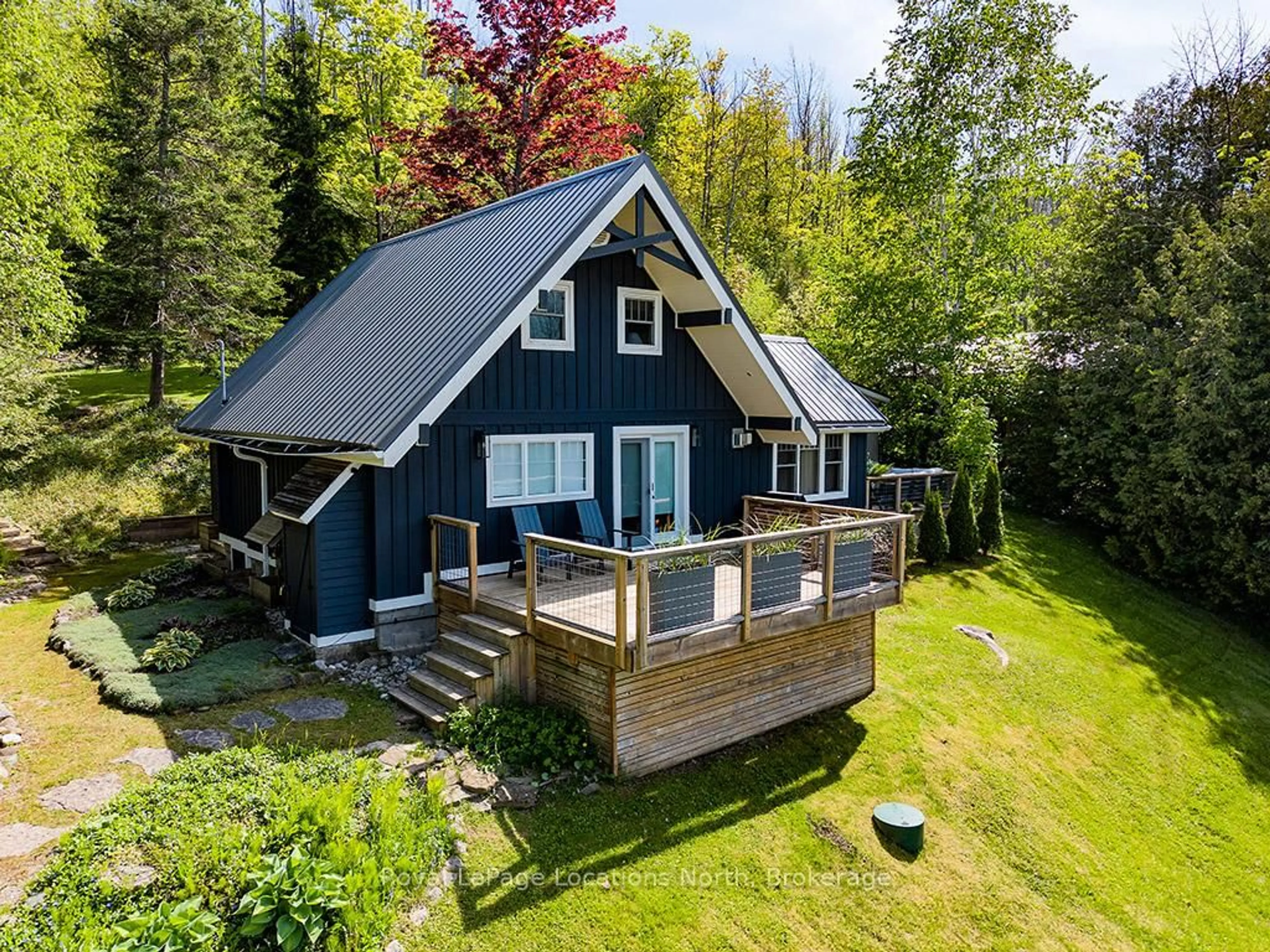 A pic from outside/outdoor area/front of a property/back of a property/a pic from drone, unknown for 104 Old 26 Highway, Meaford Ontario N4L 1W7