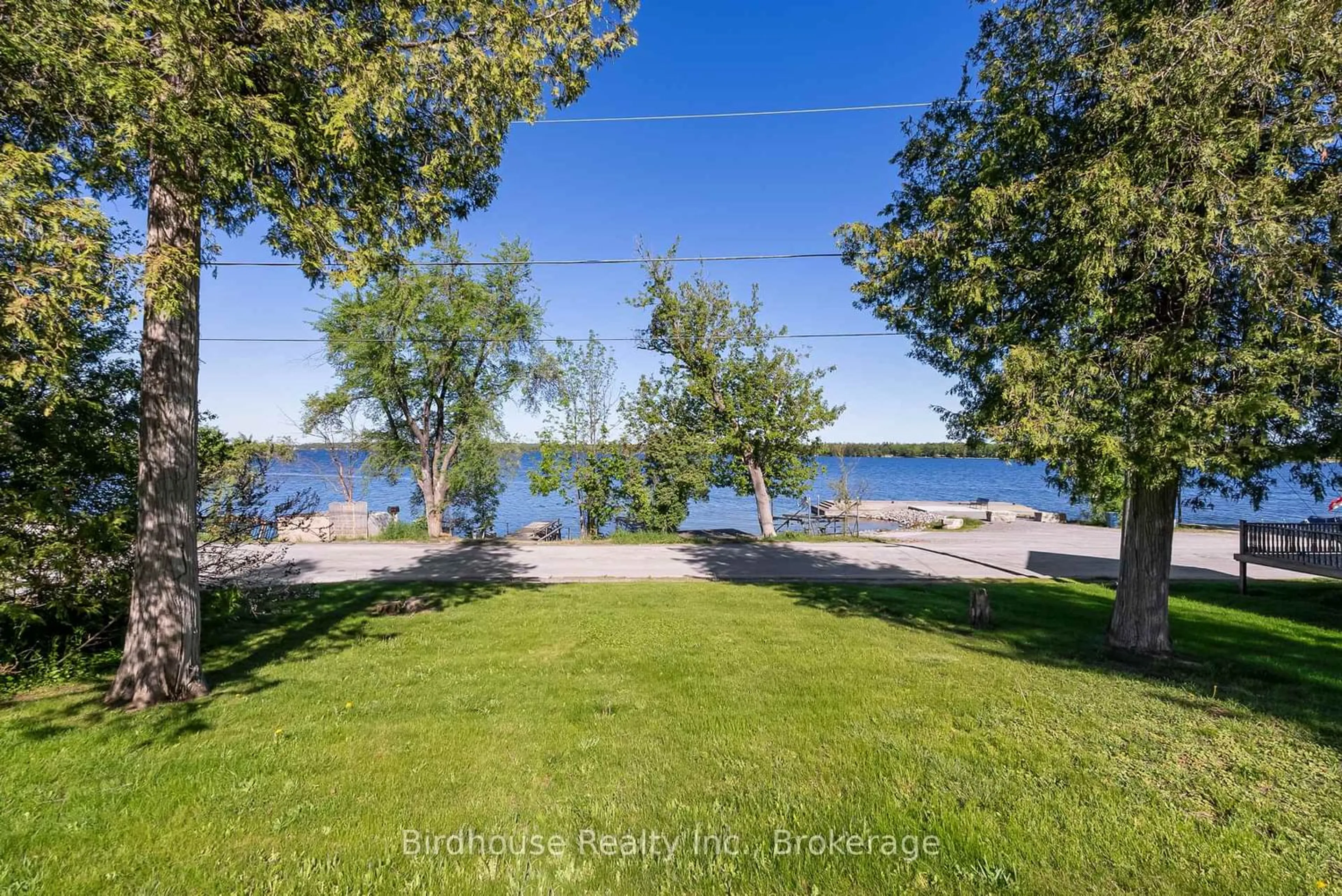 A pic from outside/outdoor area/front of a property/back of a property/a pic from drone, water/lake/river/ocean view for 30 Viamede St, Kawartha Lakes Ontario K0M 1L0