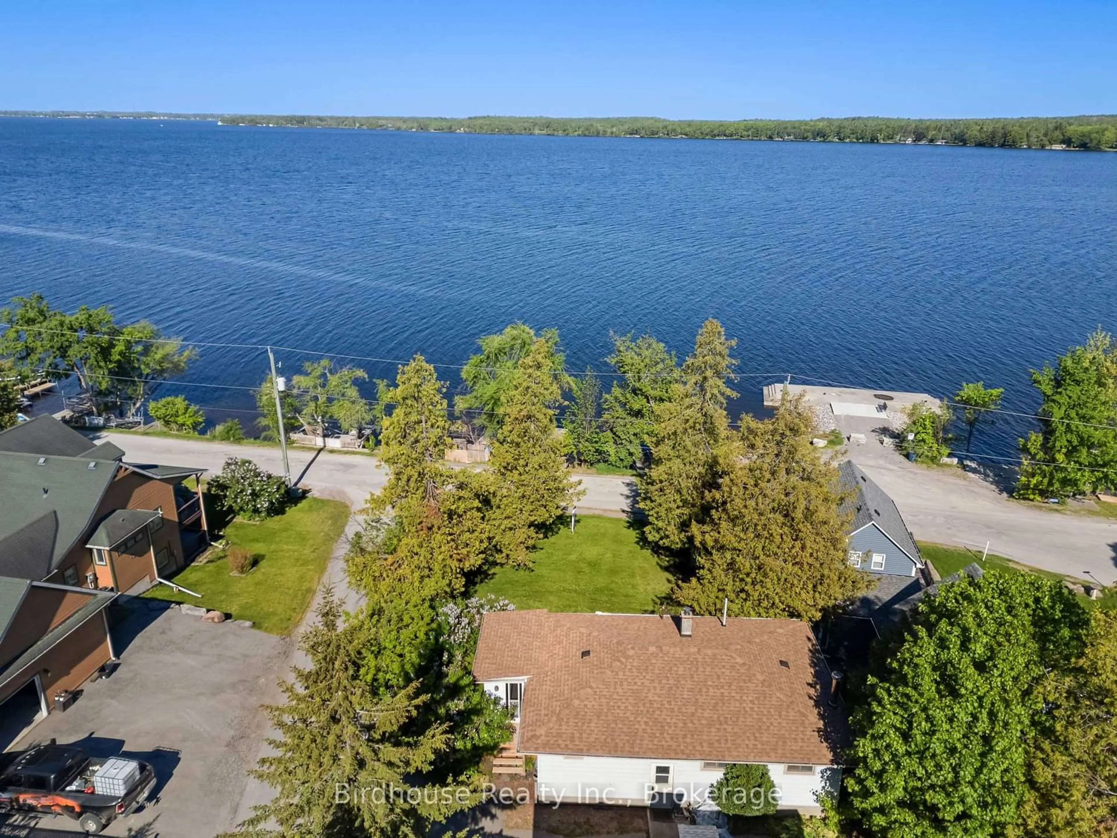 A pic from outside/outdoor area/front of a property/back of a property/a pic from drone, water/lake/river/ocean view for 30 Viamede St, Kawartha Lakes Ontario K0M 1L0