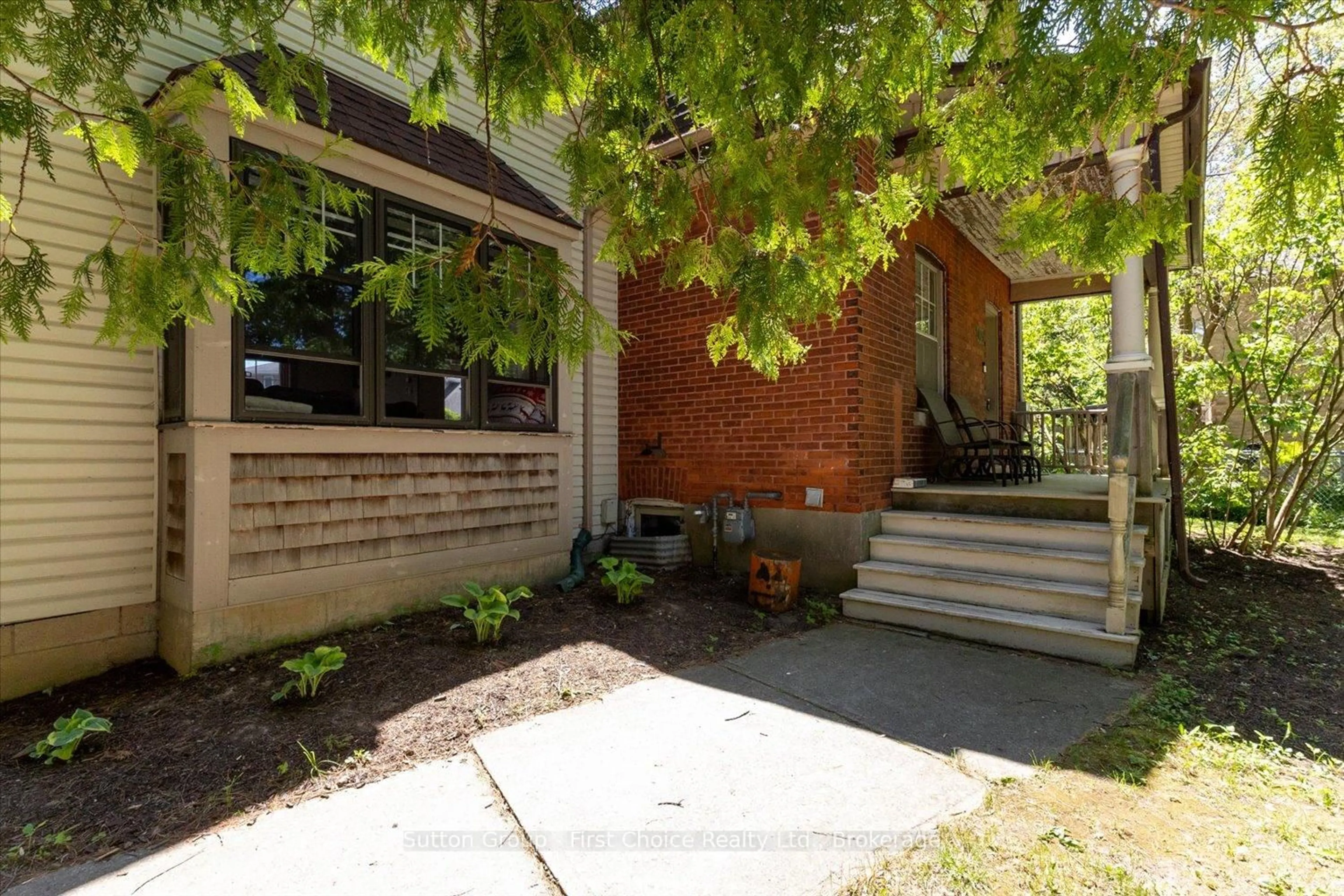 Home with brick exterior material, street for 409 Mornington St, Stratford Ontario N5A 5G7