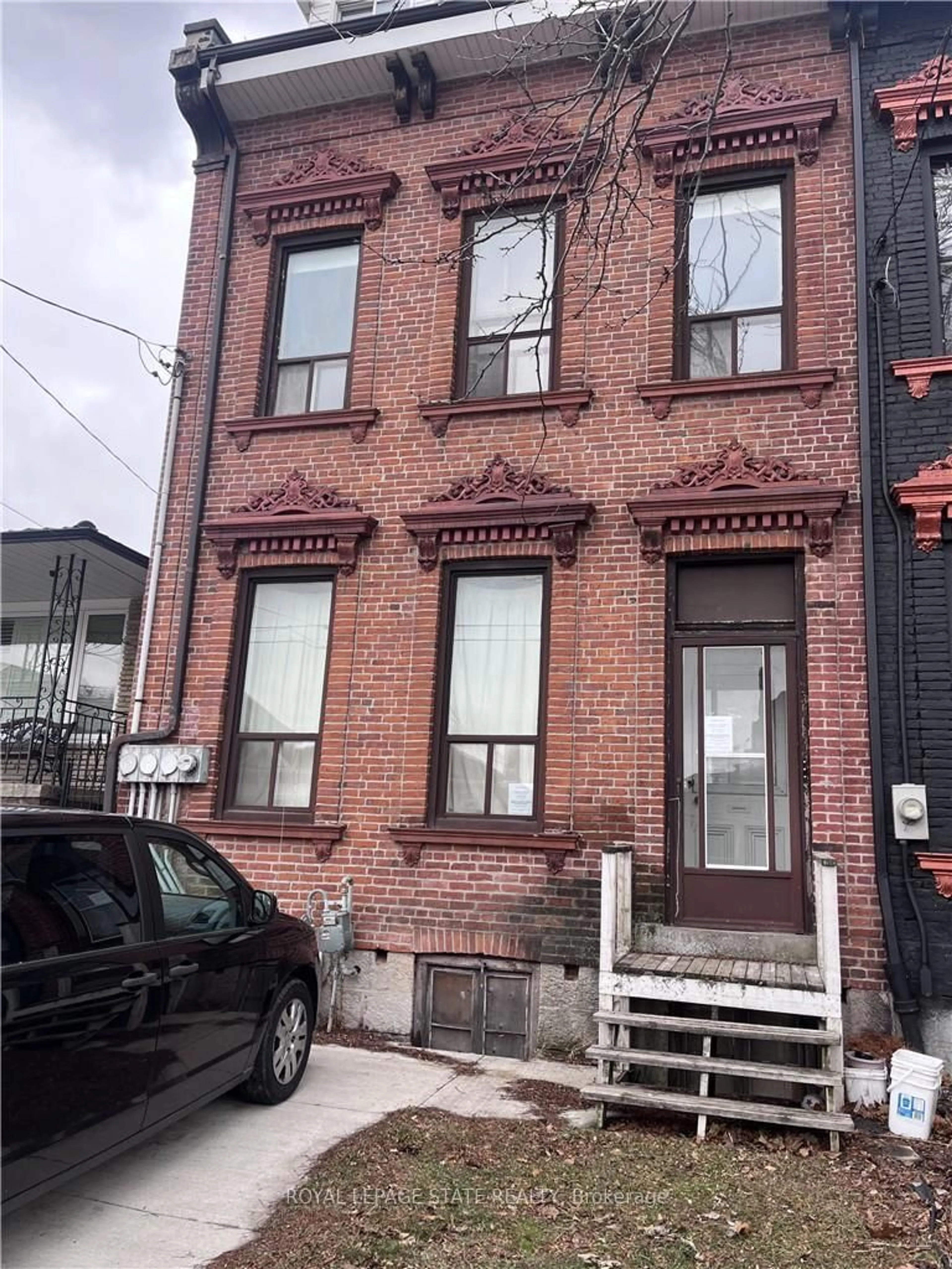 Home with brick exterior material, street for 223 Park St, Hamilton Ontario L8R 2N9