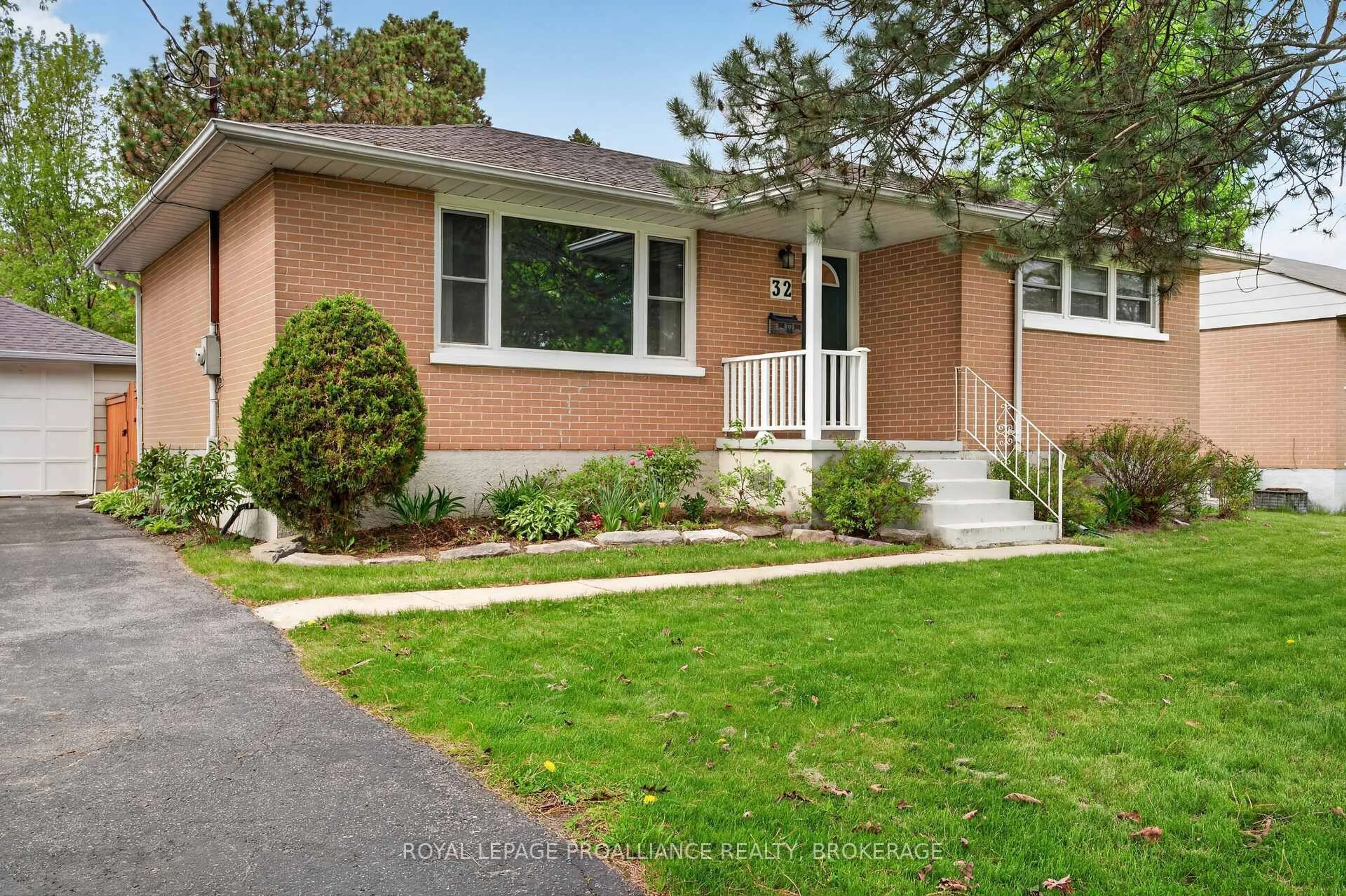 Home with brick exterior material, street for 32 Lennox St, Kingston Ontario K7M 4S2
