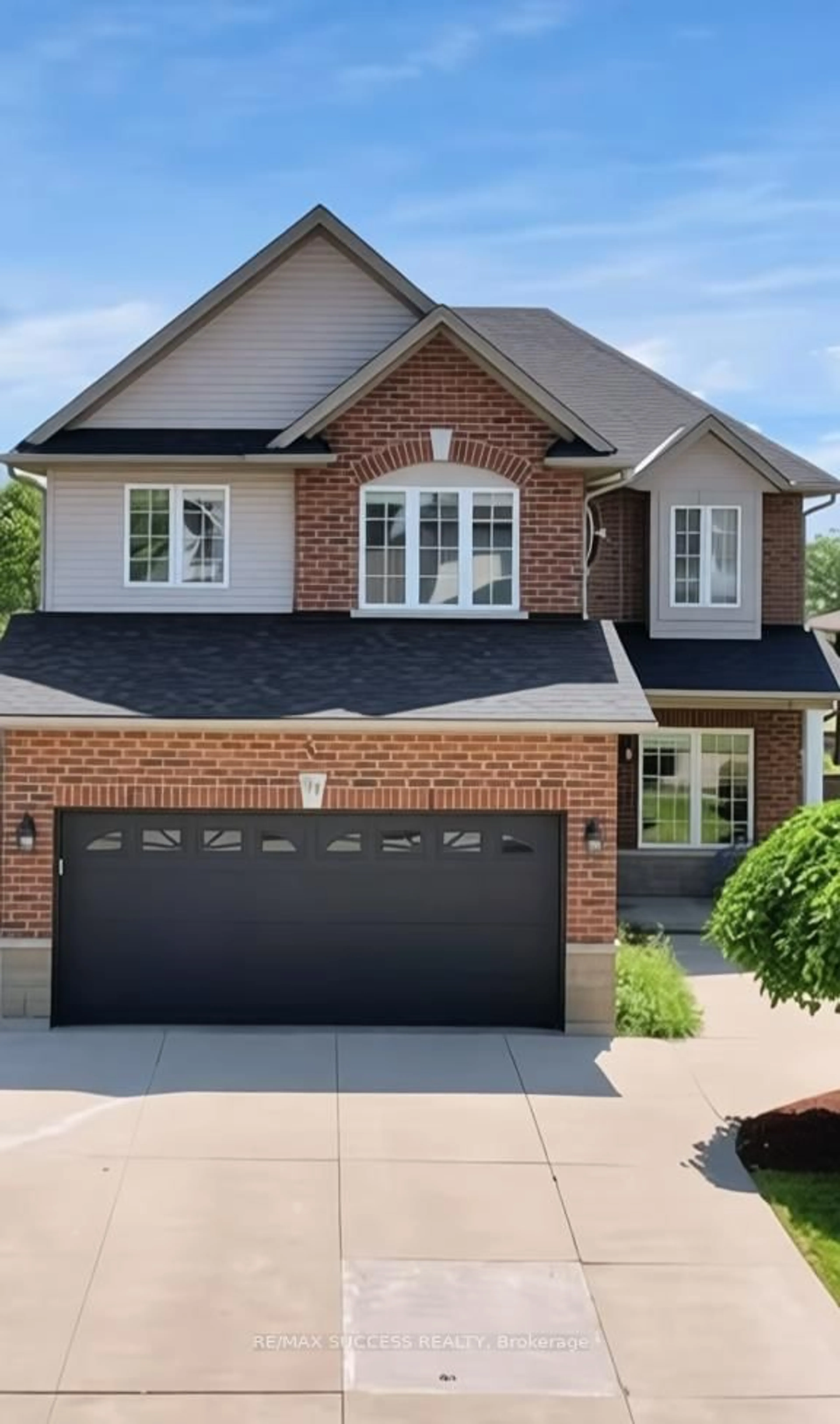 Home with brick exterior material, street for 64 Garth Trails Cres, Hamilton Ontario L9B 2X1