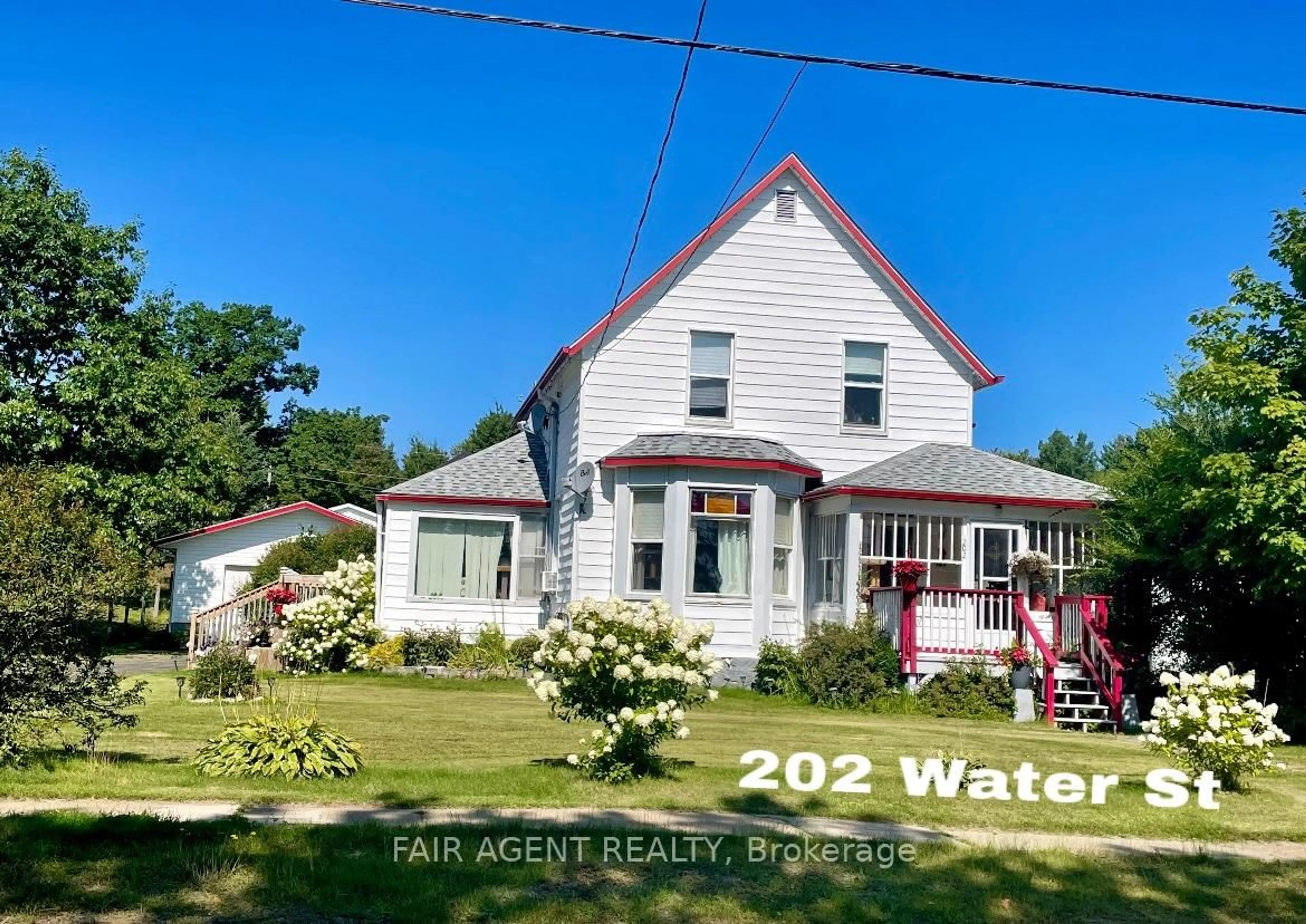 A pic from outside/outdoor area/front of a property/back of a property/a pic from drone, water/lake/river/ocean view for 202 Water St, Thessalon Ontario P0R 1L0
