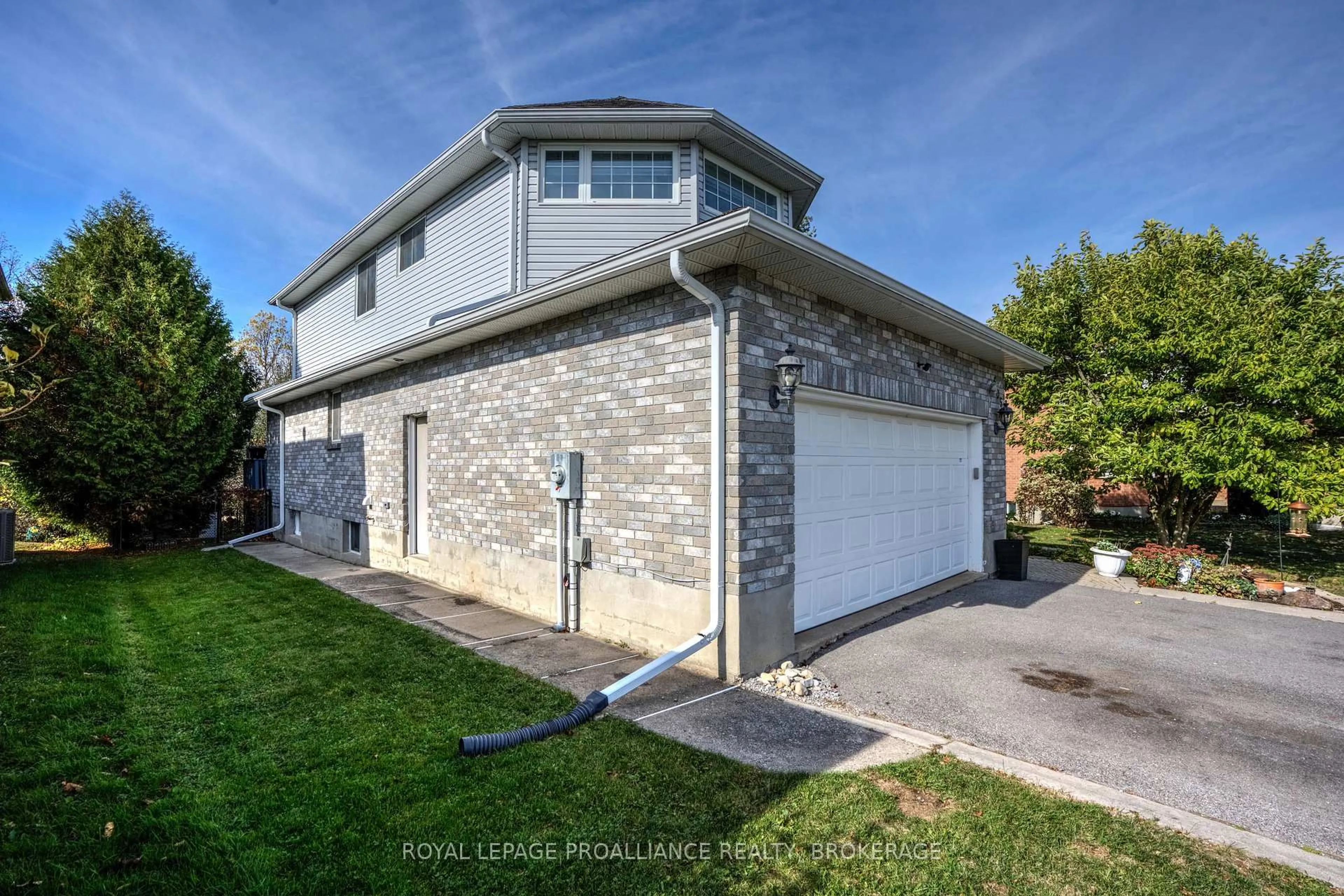 Home with brick exterior material, street for 605 Fernmoor Dr, Kingston Ontario K7M 8K5