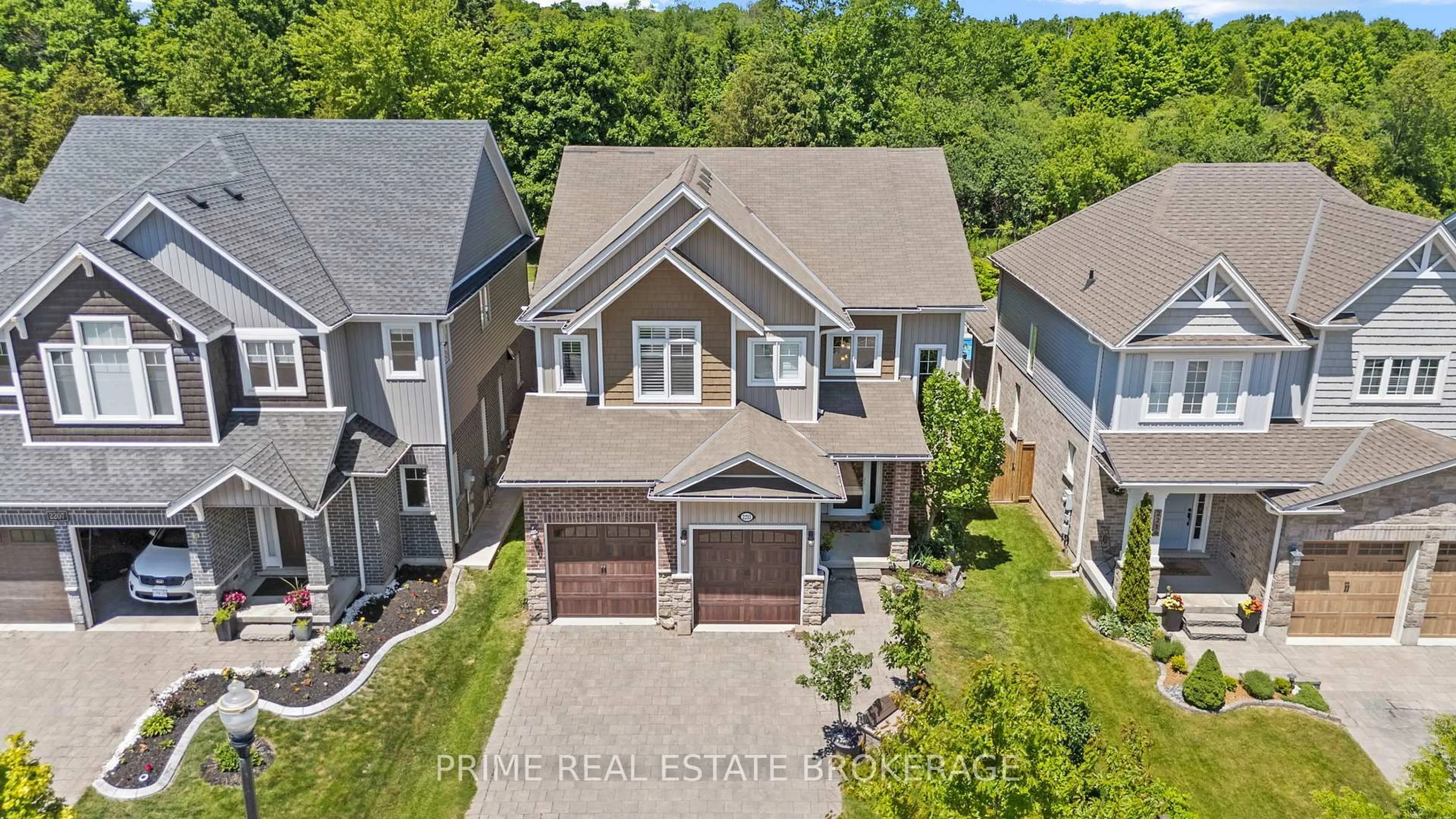 A pic from outside/outdoor area/front of a property/back of a property/a pic from drone, street for 2211 Springridge Dr, London North Ontario N5X 0M3