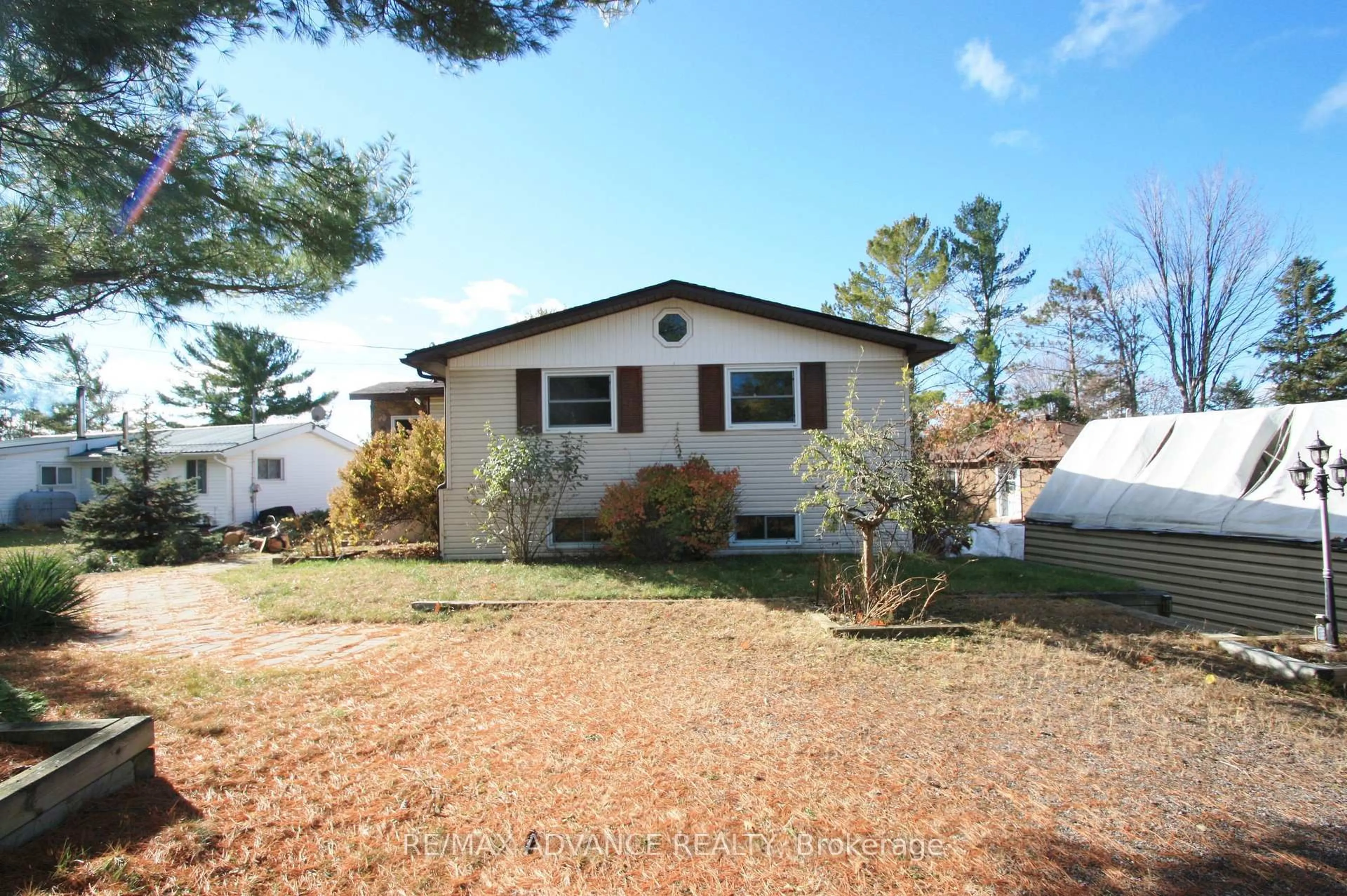 Home with vinyl exterior material, street for 77 ROCKVIEW Rd, Nipissing Ontario P0H 1H0