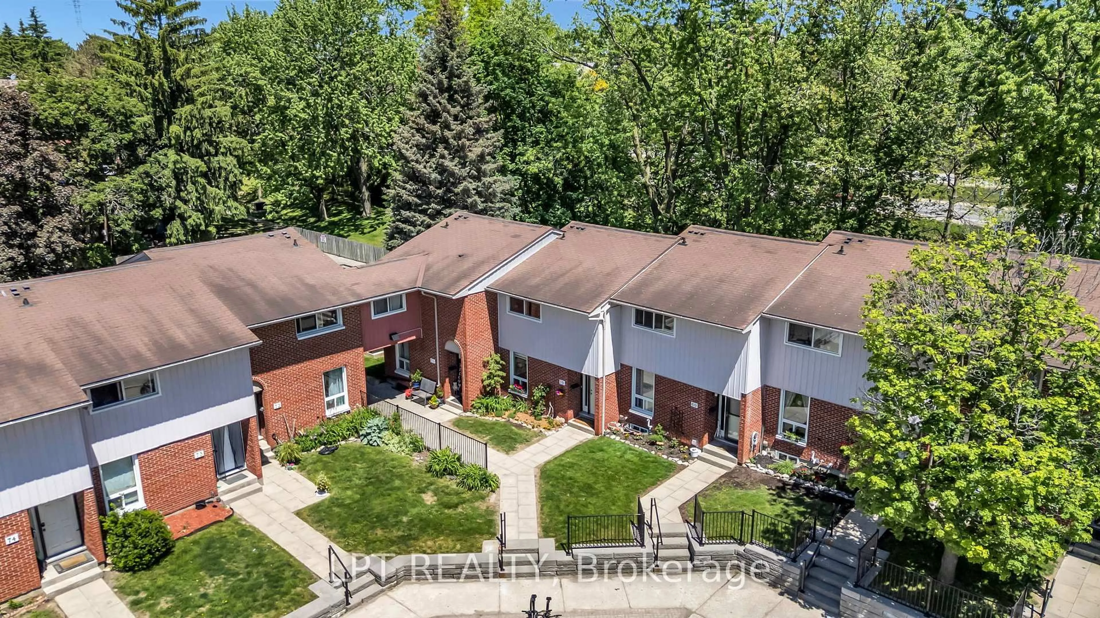 A pic from outside/outdoor area/front of a property/back of a property/a pic from drone, street for 49 Rhonda Rd #70, Guelph Ontario N1H 7A4