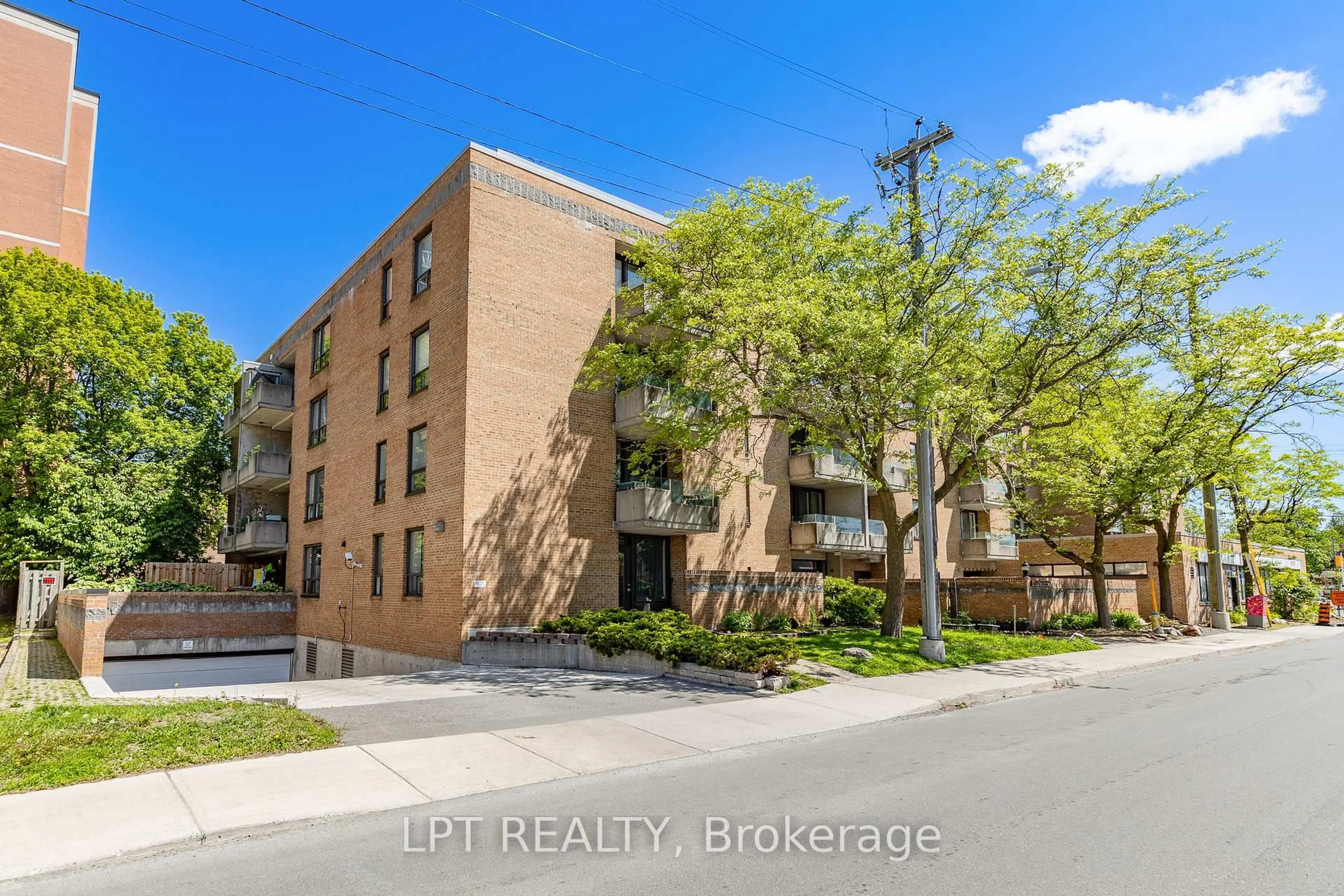 A pic from outside/outdoor area/front of a property/back of a property/a pic from drone, street for 1177 Belanger Ave #206, Ottawa Ontario K1H 8N7