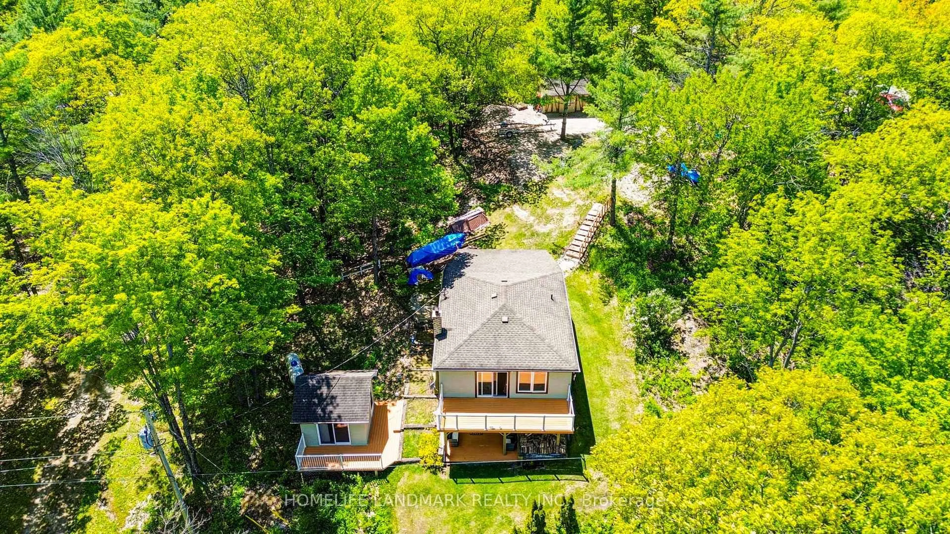A pic from outside/outdoor area/front of a property/back of a property/a pic from drone, unknown for 433 WHITES FALLS Rd, Georgian Bay Ontario L0K 1S0
