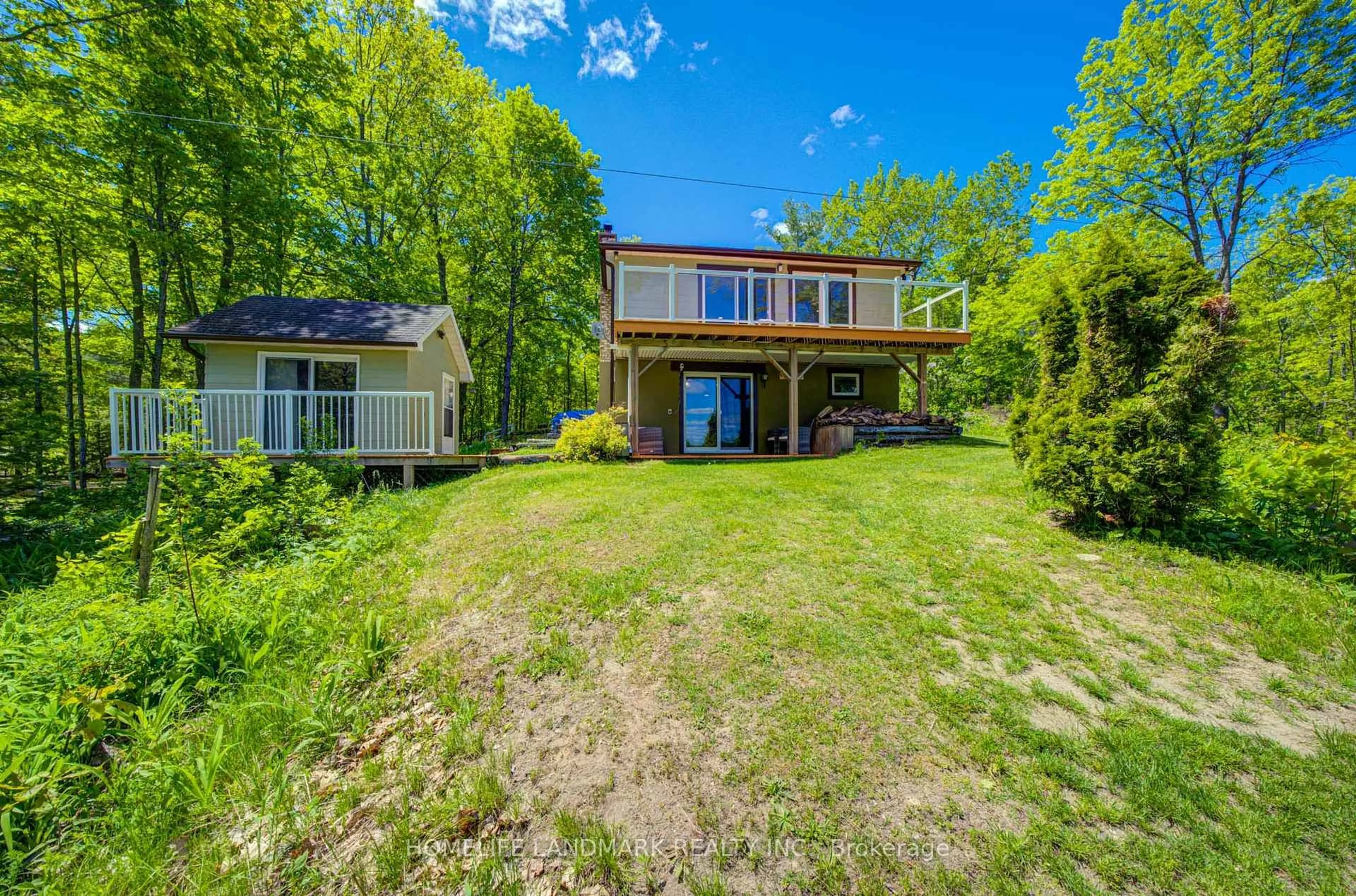 A pic from outside/outdoor area/front of a property/back of a property/a pic from drone, water/lake/river/ocean view for 433 WHITES FALLS Rd, Georgian Bay Ontario L0K 1S0