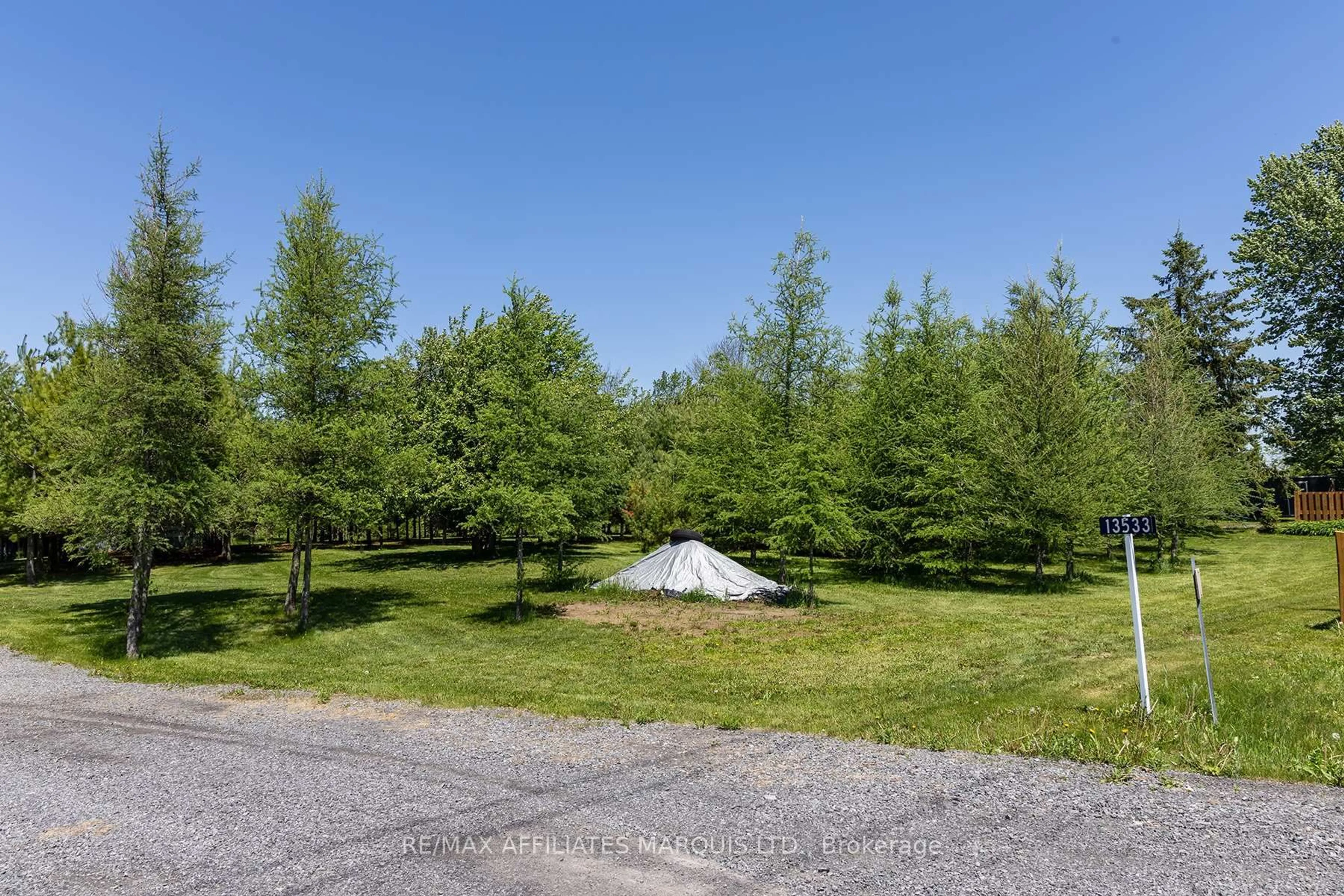 A pic from outside/outdoor area/front of a property/back of a property/a pic from drone, forest/trees view for 13533 Nudell Bush Rd, South Dundas Ontario K0C 1X0