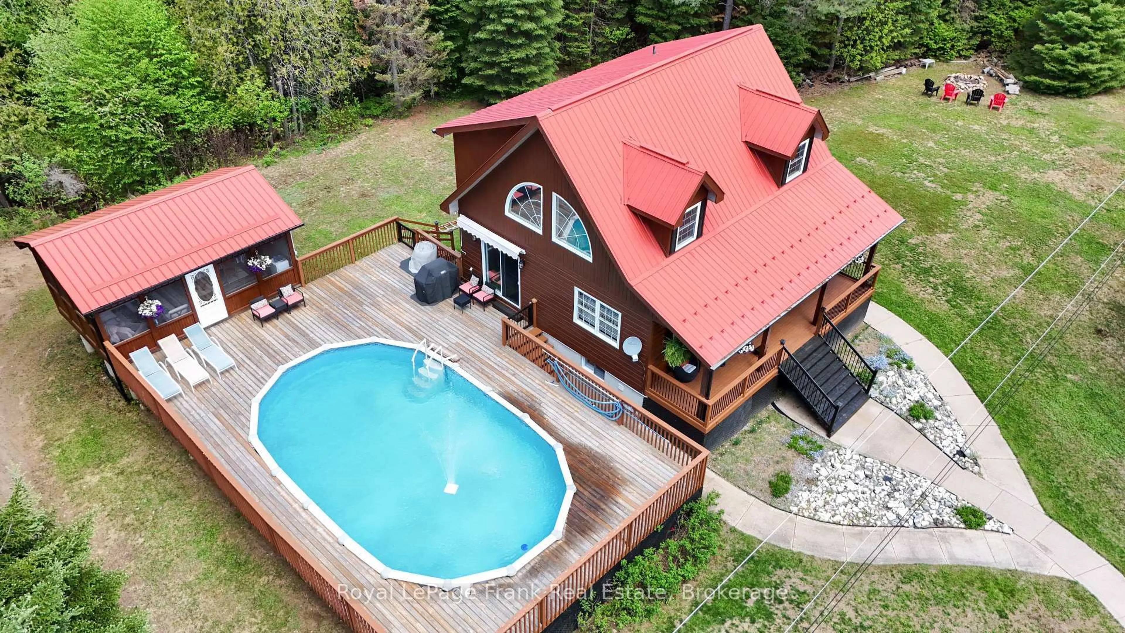 A pic from outside/outdoor area/front of a property/back of a property/a pic from drone, water/lake/river/ocean view for 1291 South Wilberforce Rd, Highlands East Ontario K0L 2Y0