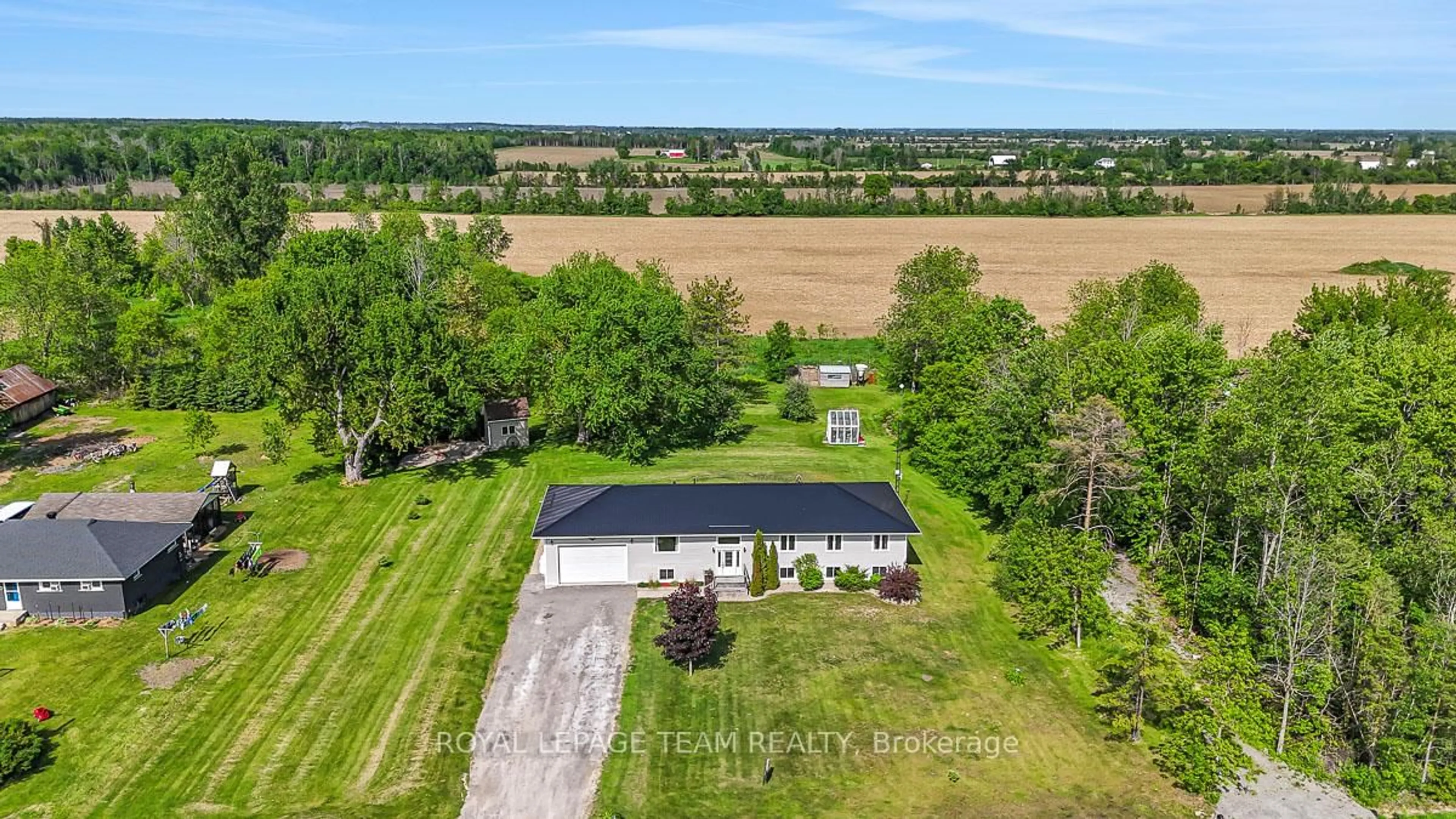A pic from outside/outdoor area/front of a property/back of a property/a pic from drone, water/lake/river/ocean view for 229 Magee Rd, North Grenville Ontario K0G 1J0