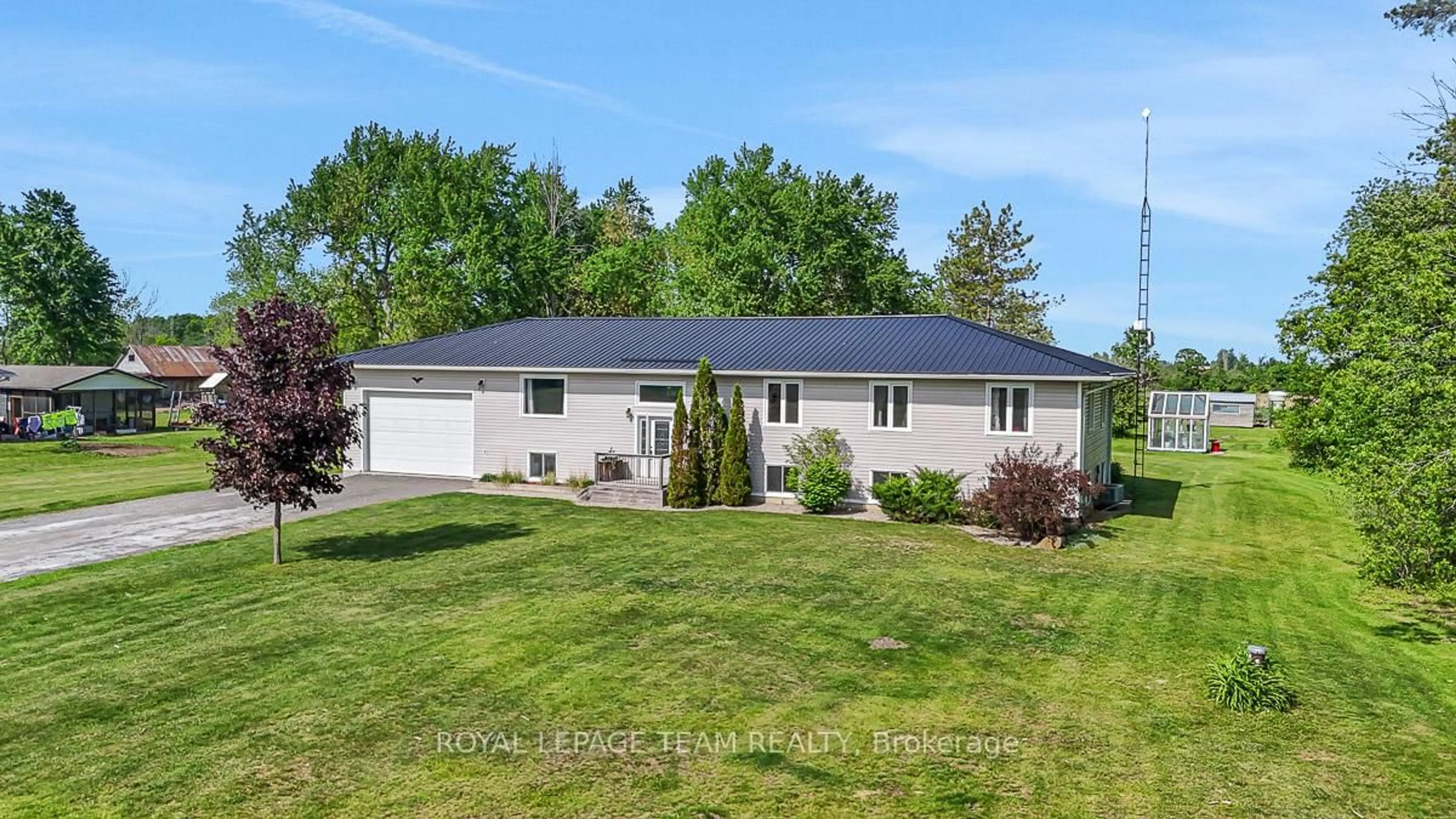 Home with vinyl exterior material, street for 229 Magee Rd, North Grenville Ontario K0G 1J0