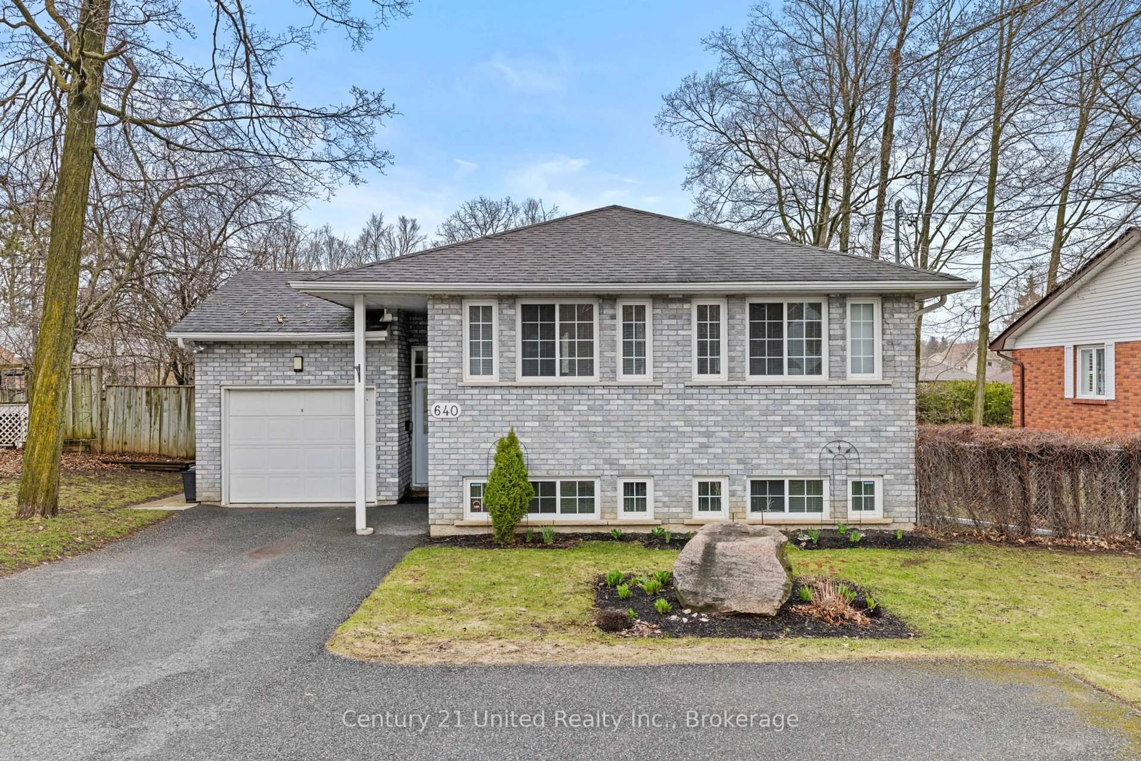 Home with brick exterior material, street for 640 Brealey Dr, Peterborough Ontario K9K 2M7
