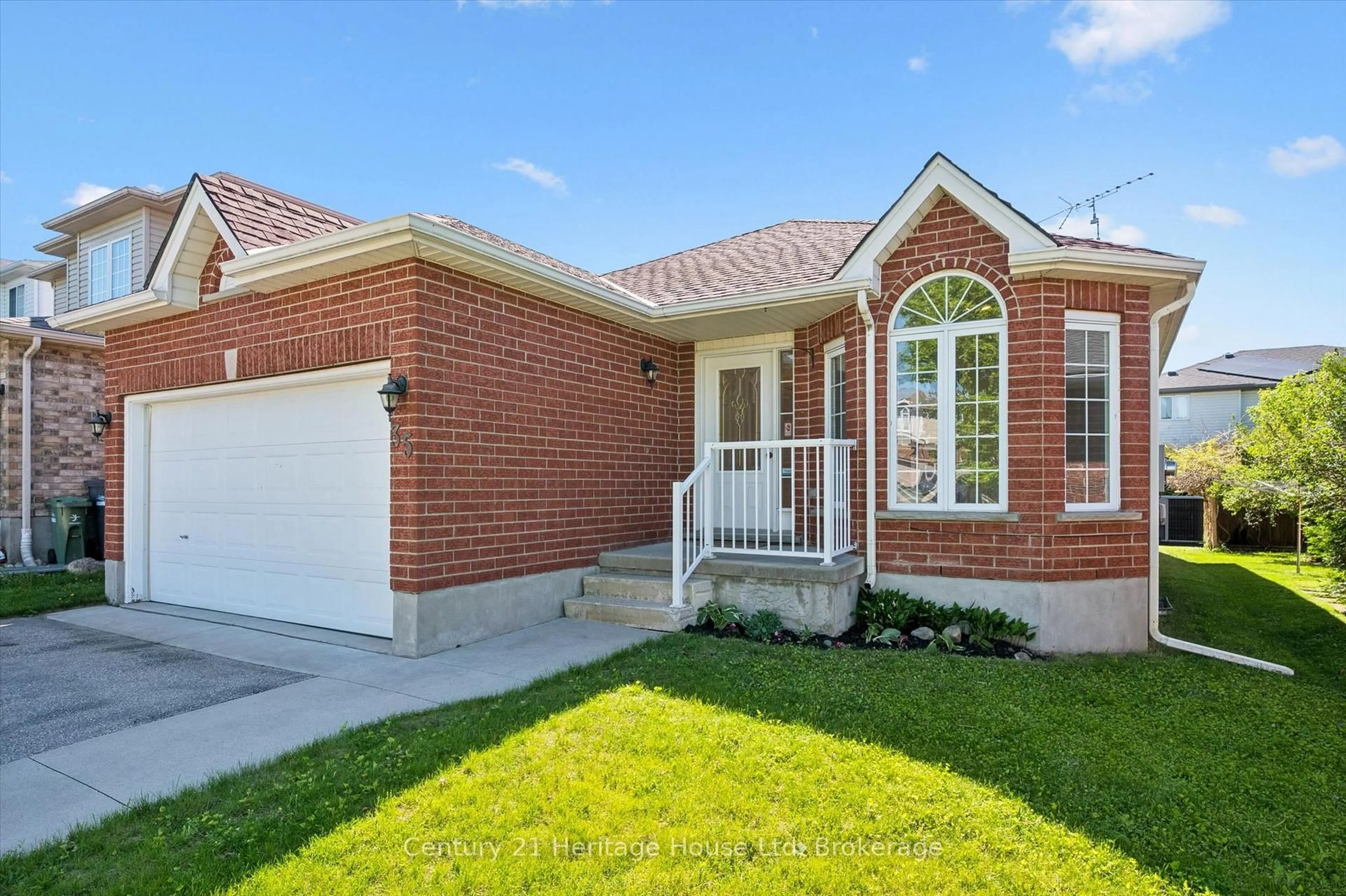 Home with brick exterior material, street for 35 Shackleton Dr, Guelph Ontario N1E 7K5
