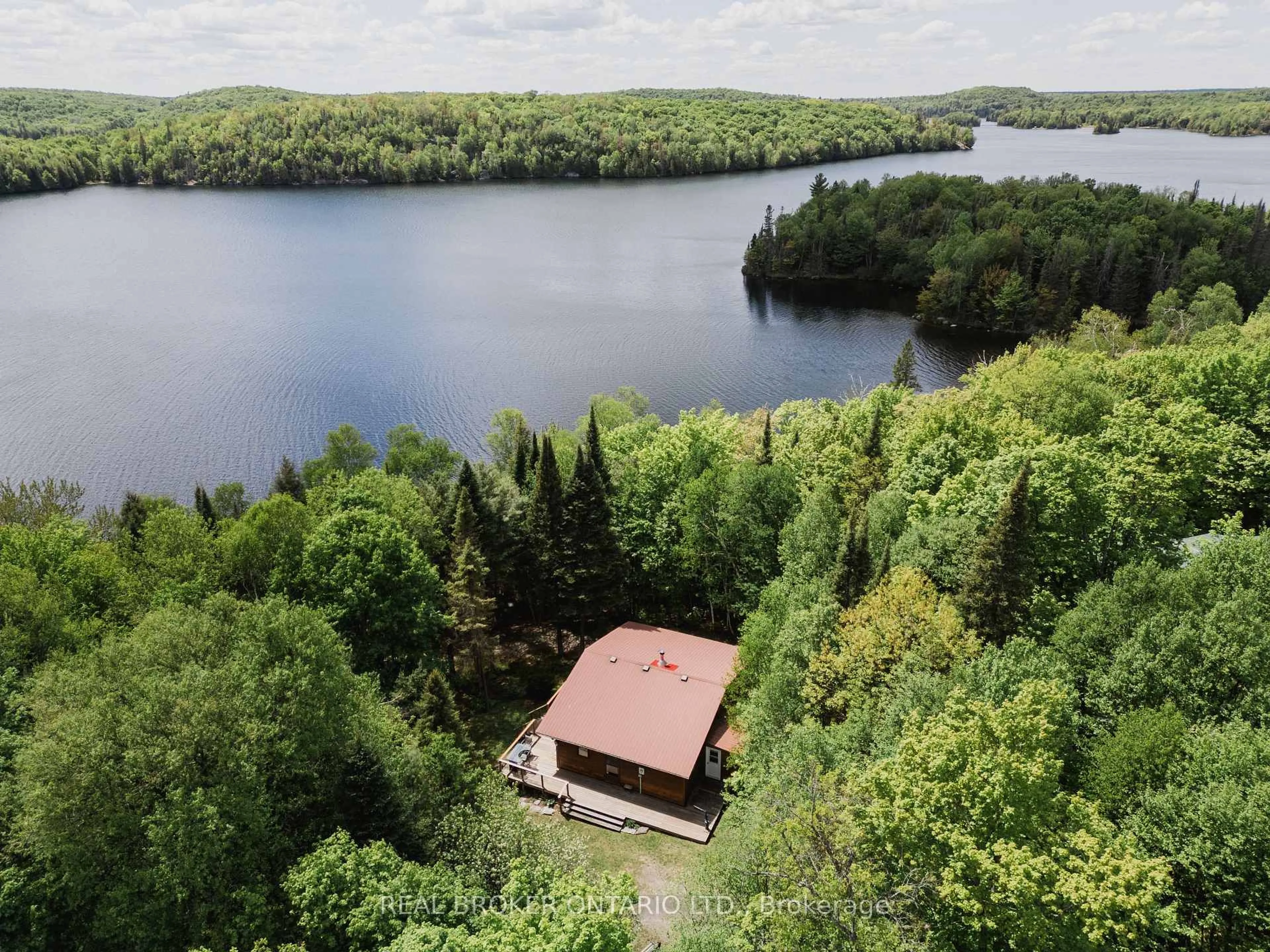 A pic from outside/outdoor area/front of a property/back of a property/a pic from drone, water/lake/river/ocean view for 888 Bray Lake Rd, Machar Ontario P0A 1X0
