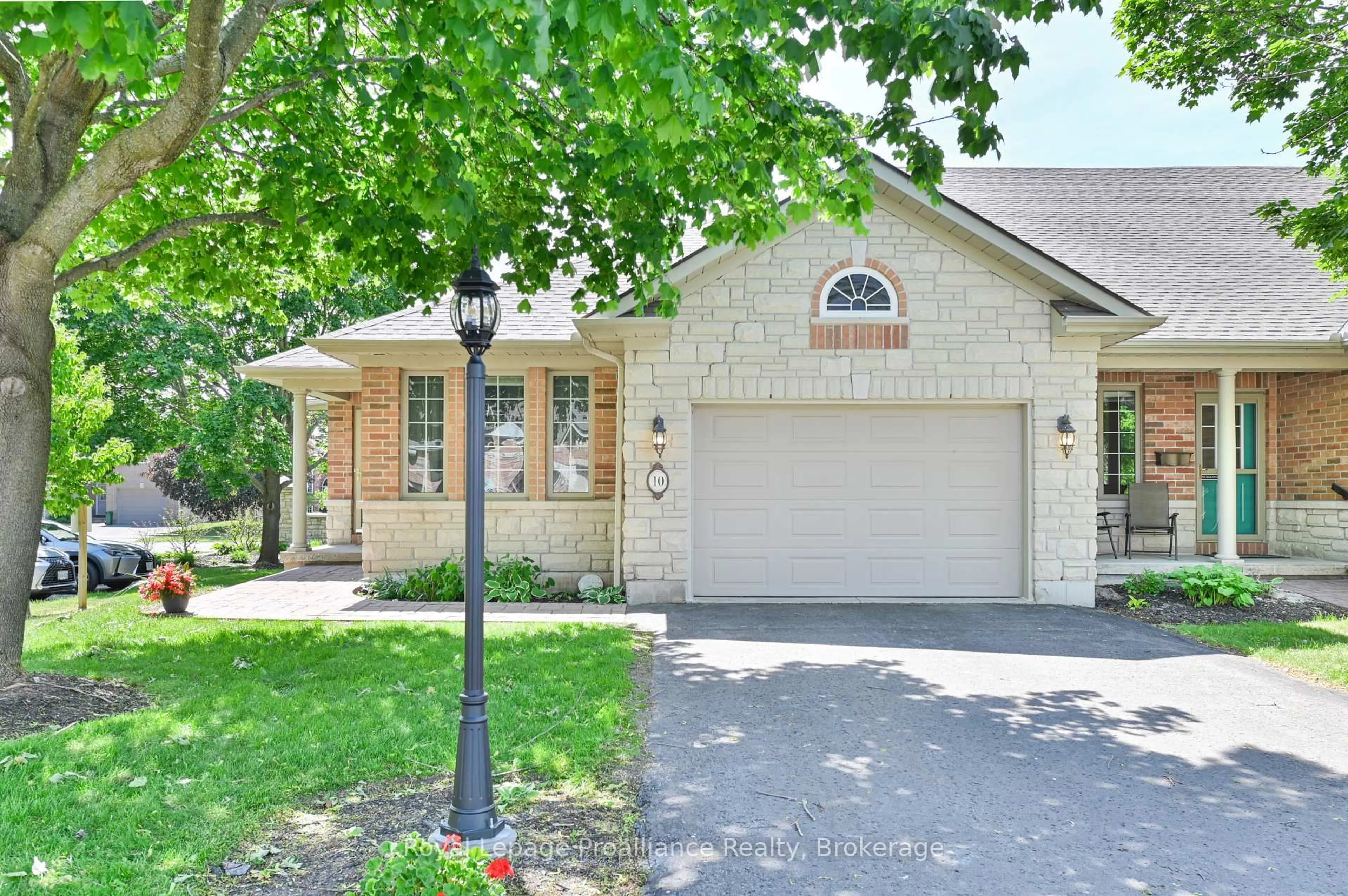Home with brick exterior material, street for 25 Heartwood Dr #10, Belleville Ontario K8P 5M2