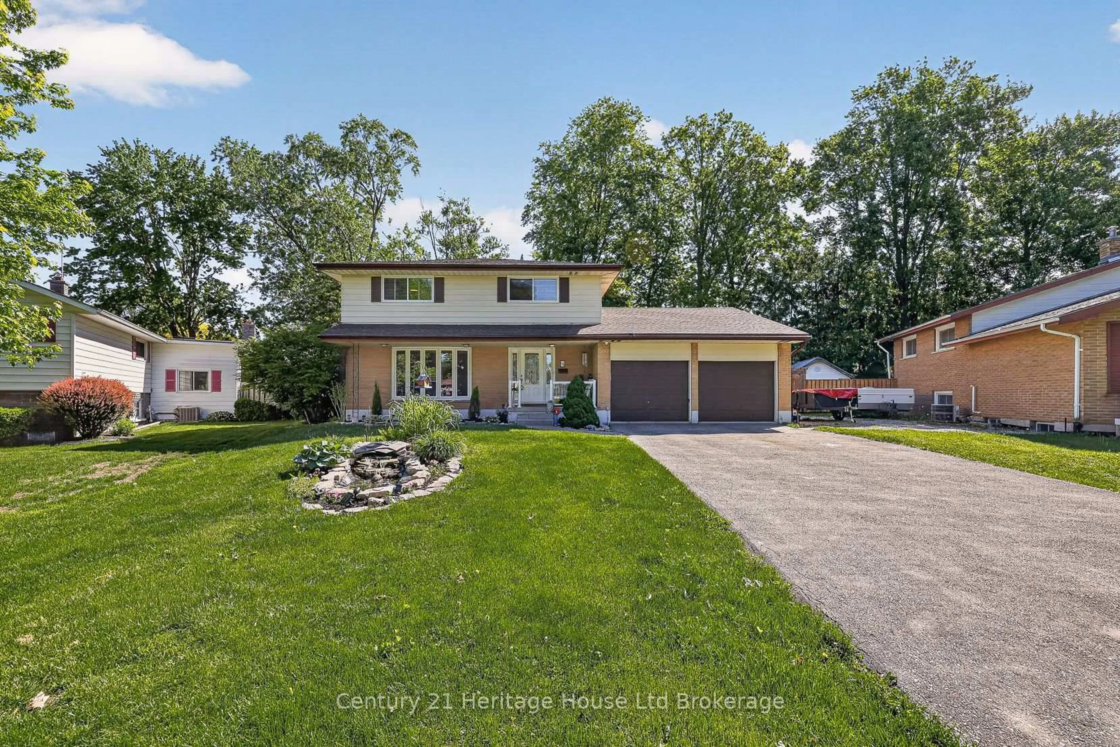 Home with brick exterior material, street for 12 Jubilee Pl, Woodstock Ontario N4S 7H2