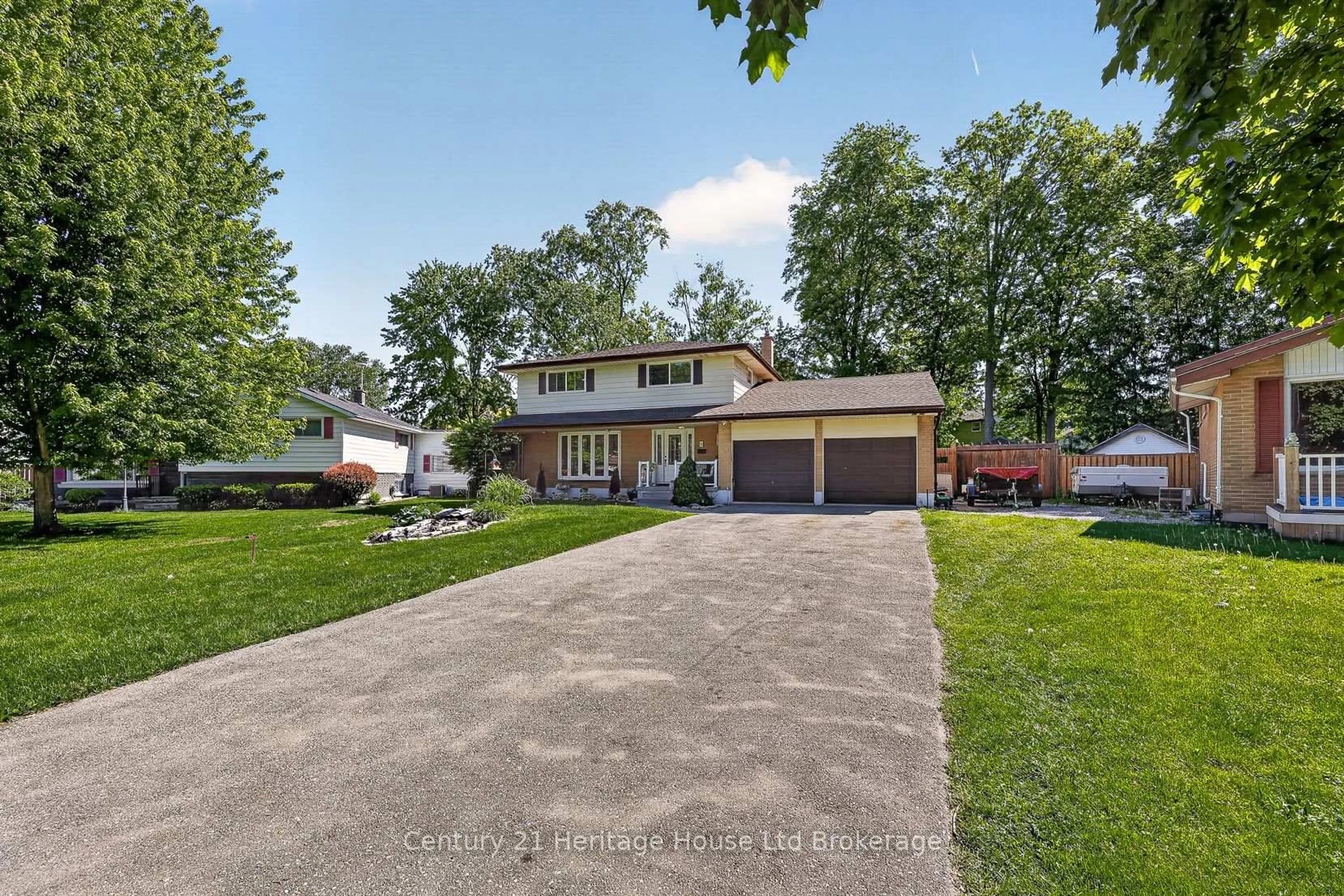 A pic from outside/outdoor area/front of a property/back of a property/a pic from drone, street for 12 Jubilee Pl, Woodstock Ontario N4S 7H2