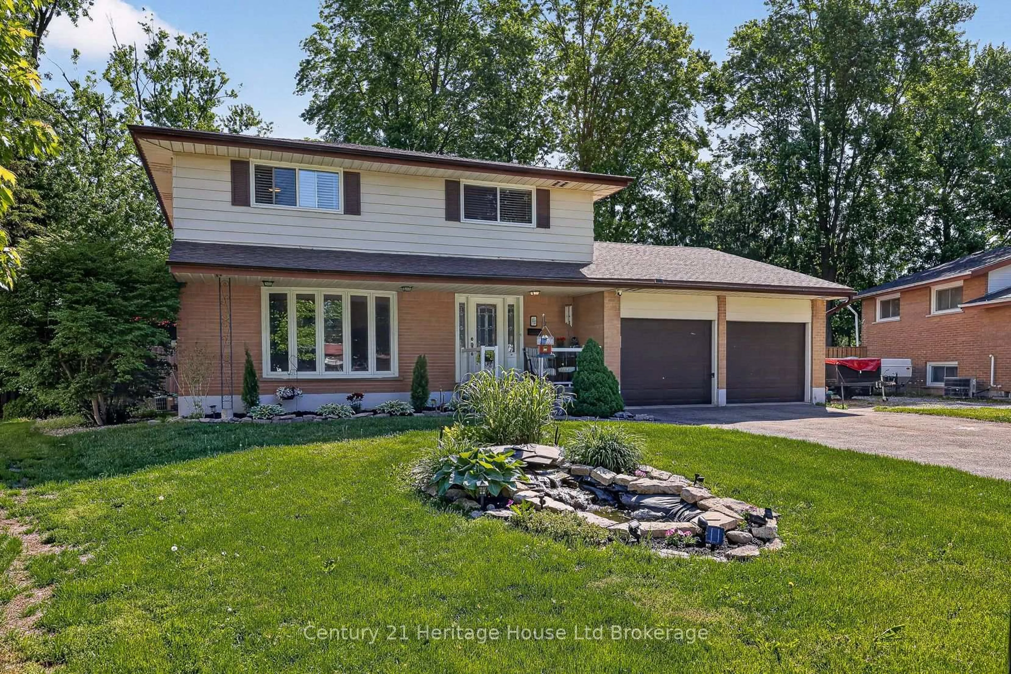 Home with brick exterior material, street for 12 Jubilee Pl, Woodstock Ontario N4S 7H2