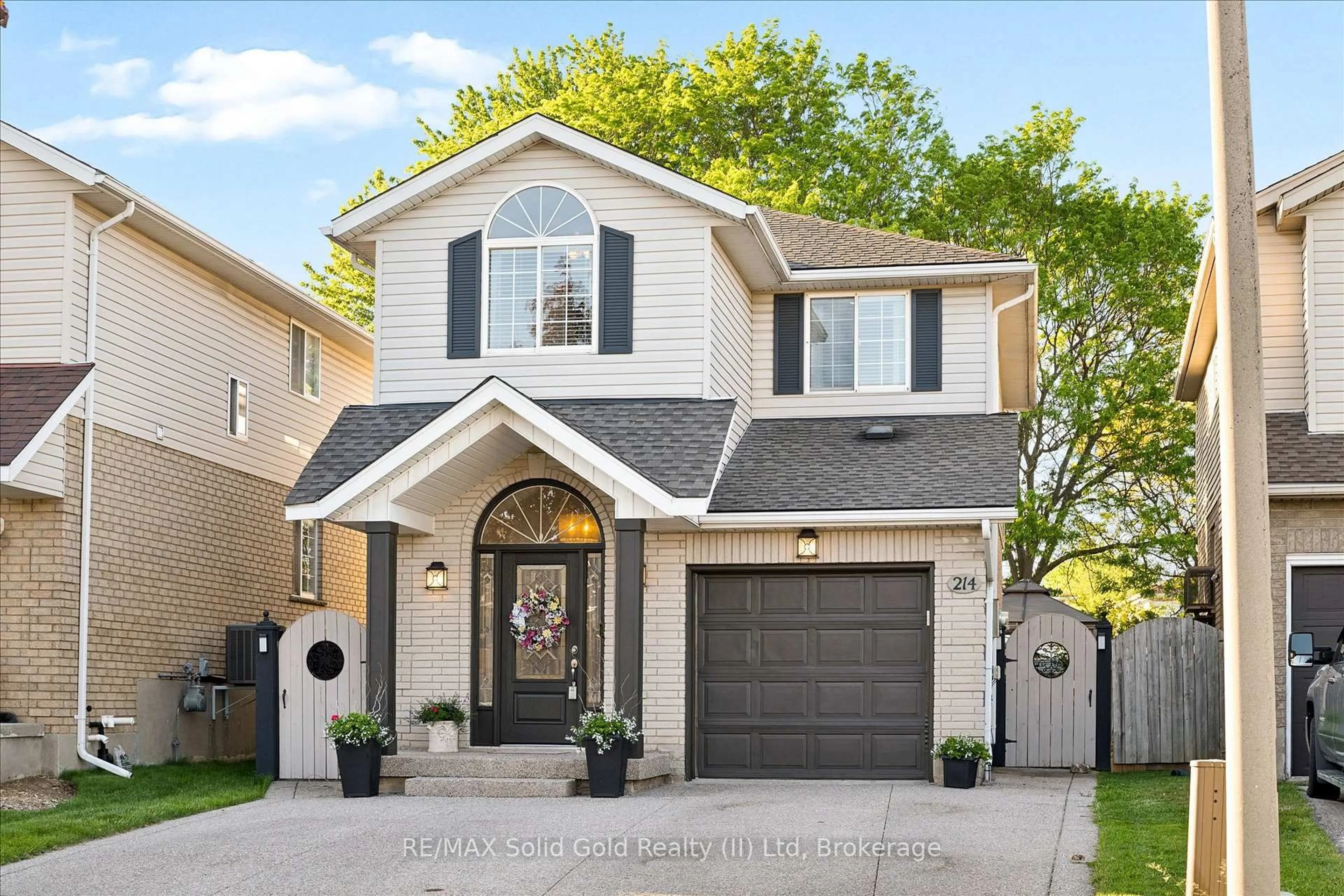 Home with vinyl exterior material, street for 214 Grey Fox Dr, Kitchener Ontario N2E 3N2