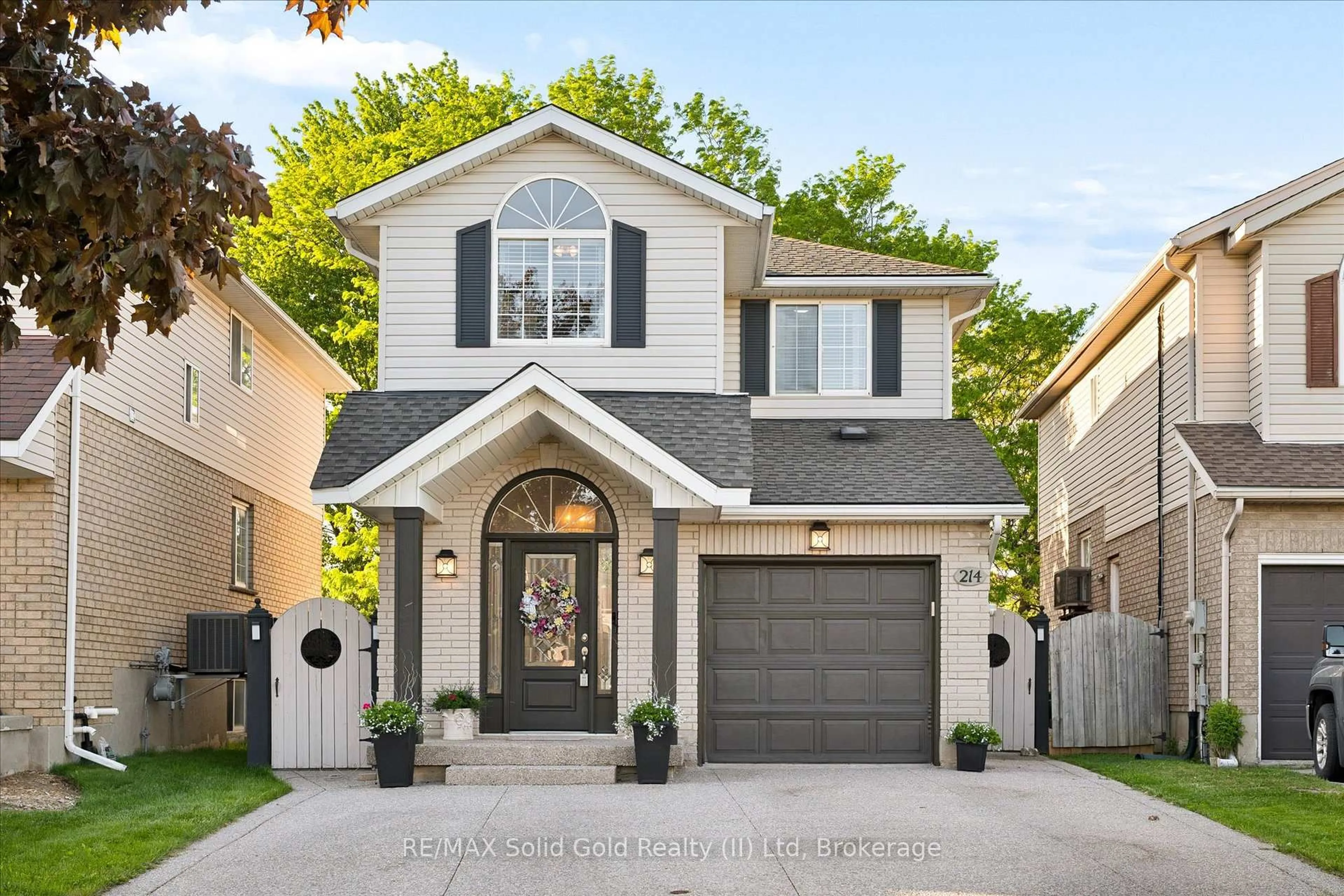 Home with brick exterior material, street for 214 Grey Fox Dr, Kitchener Ontario N2E 3N2