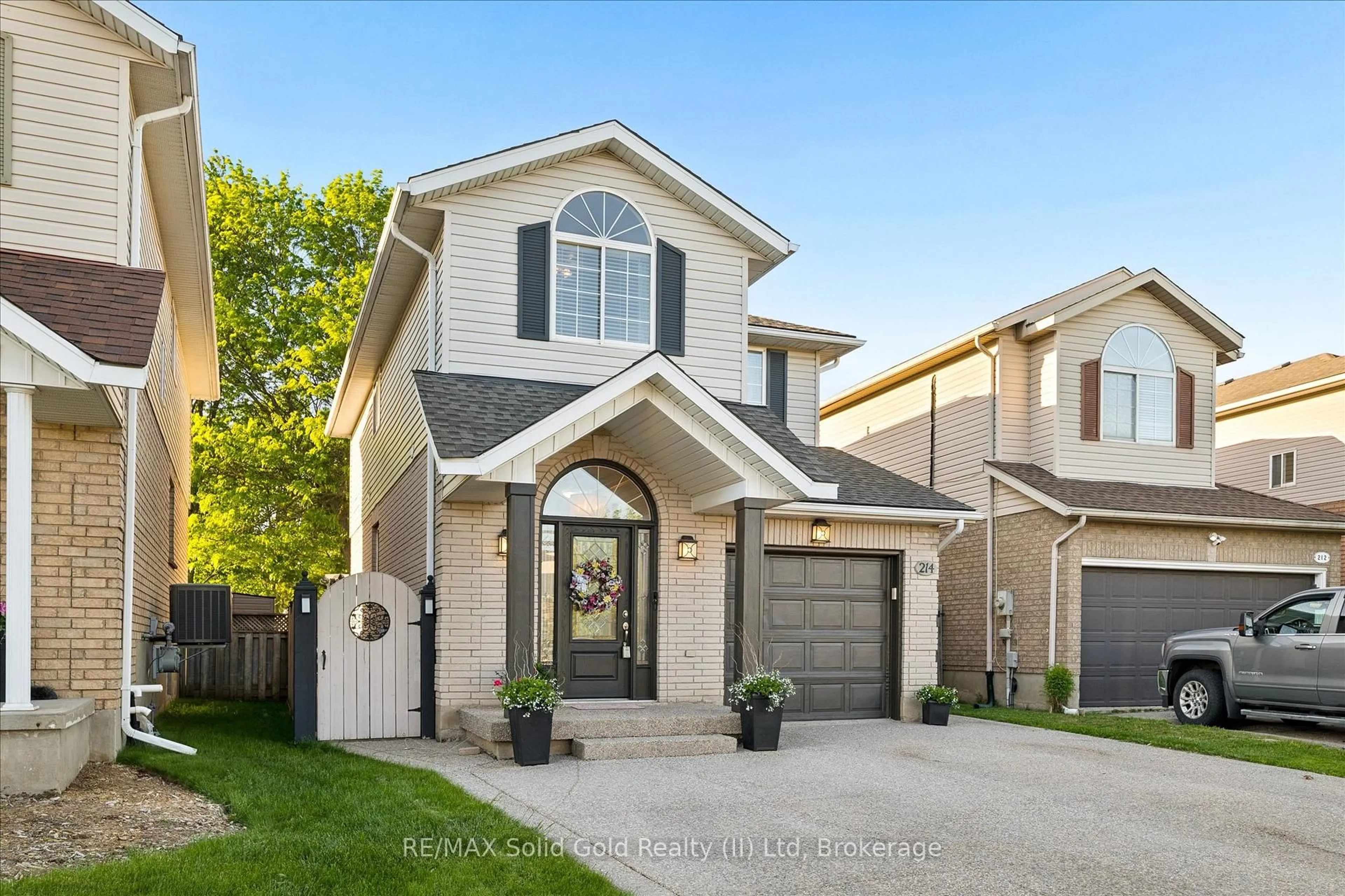 Home with brick exterior material, street for 214 Grey Fox Dr, Kitchener Ontario N2E 3N2