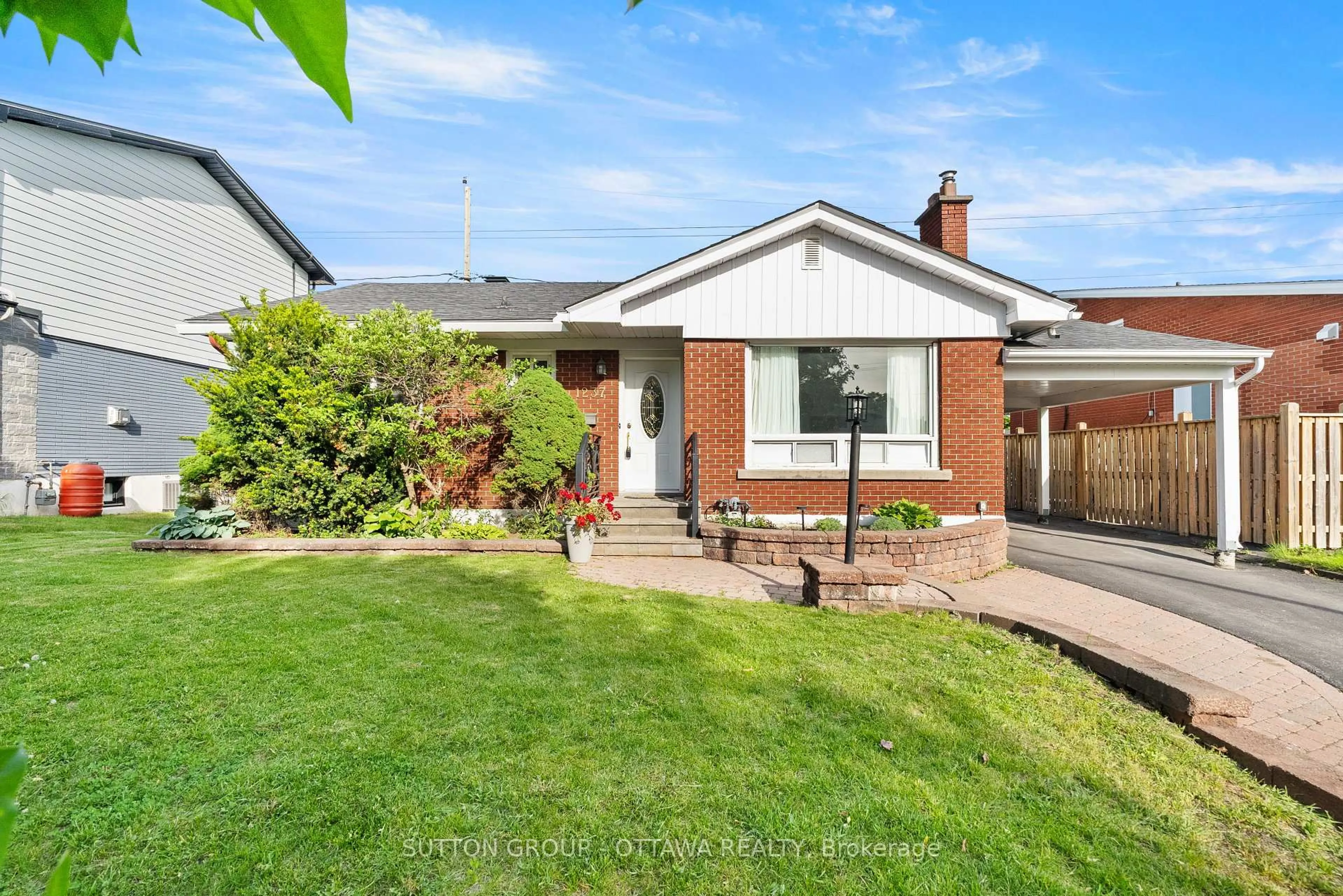 Home with brick exterior material, street for 1237 Whitmore Ave, Ottawa Ontario K2C 2N6