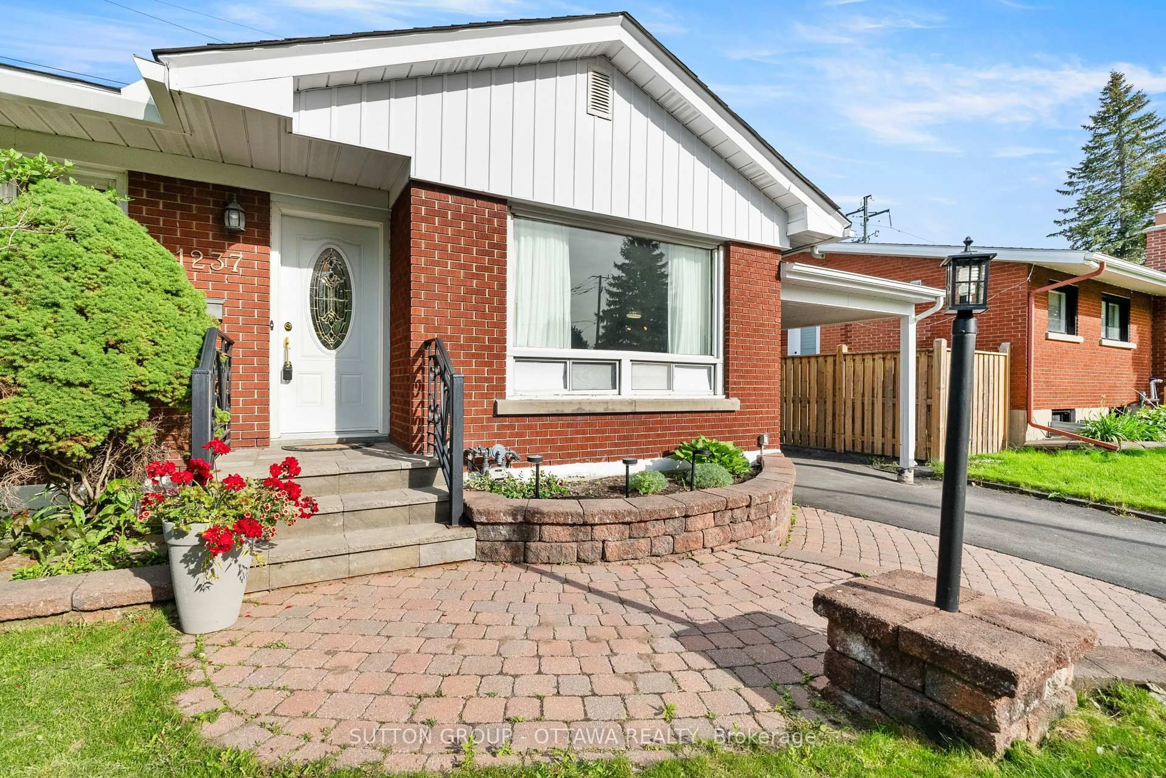 Home with brick exterior material, street for 1237 Whitmore Ave, Ottawa Ontario K2C 2N6