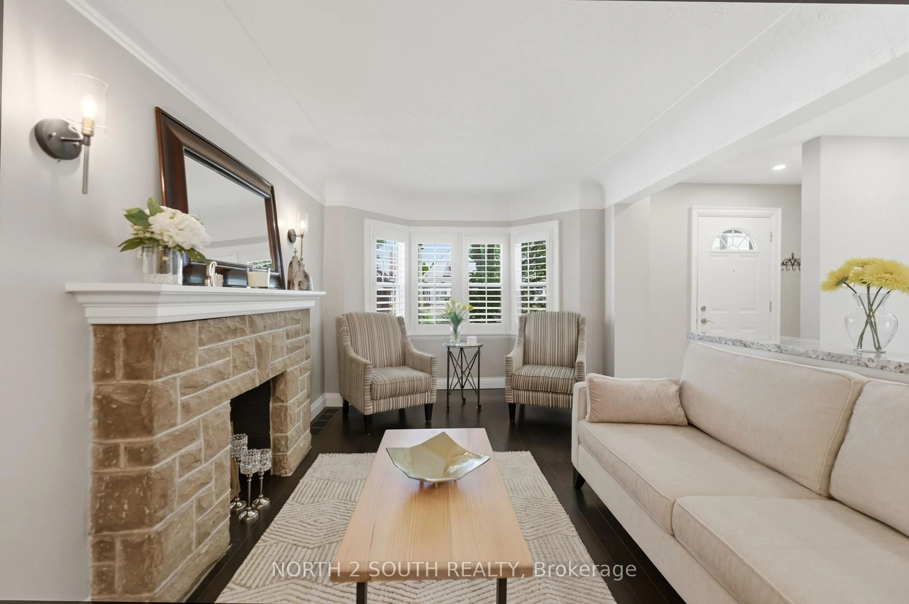 Living room with furniture, ceramic/tile floor for 212 Wexford Ave, Hamilton Ontario L8K 2P2