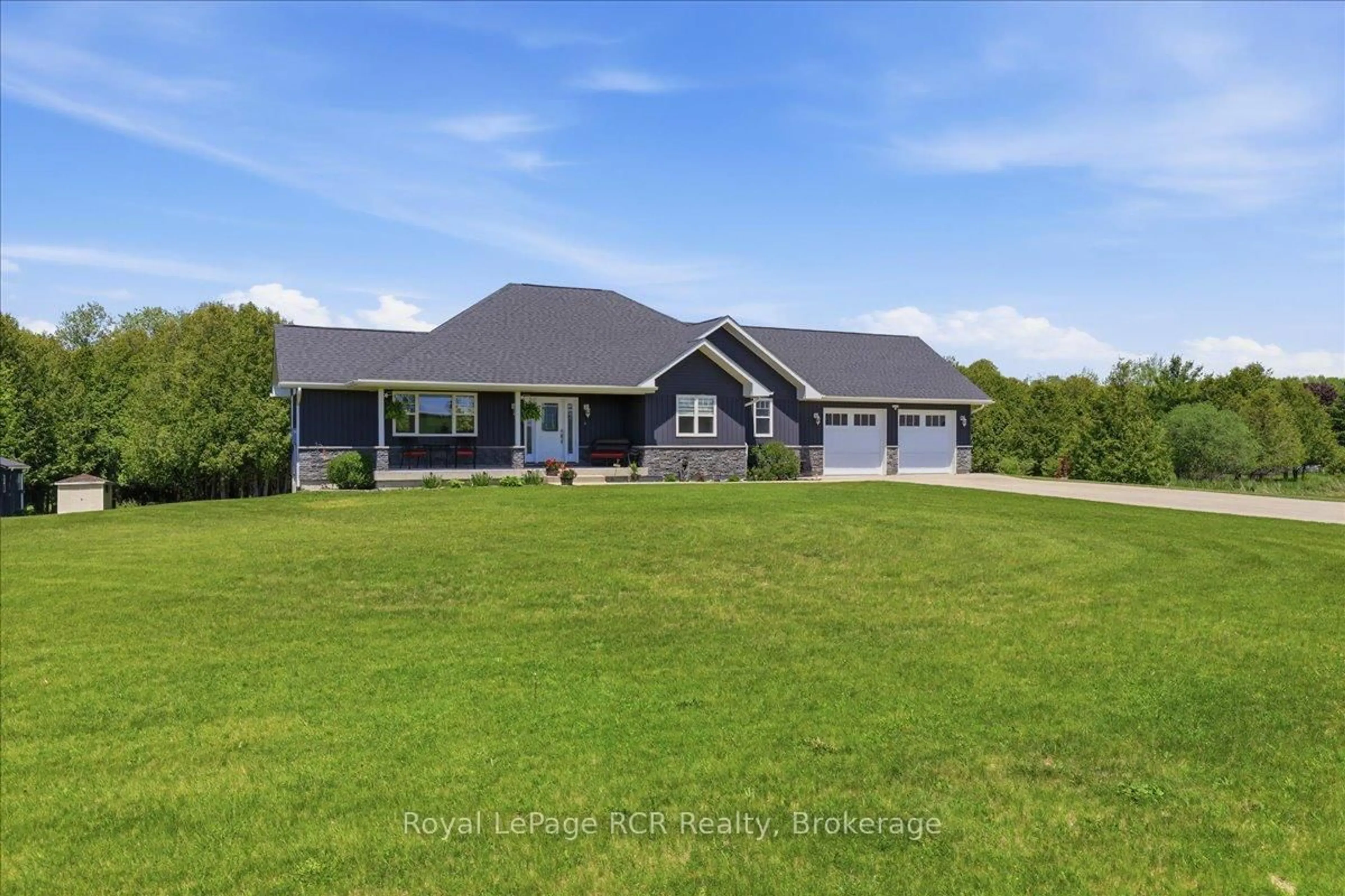 A pic from outside/outdoor area/front of a property/back of a property/a pic from drone, unknown for 6442 Given Rd, Minto Ontario N0G 1M0