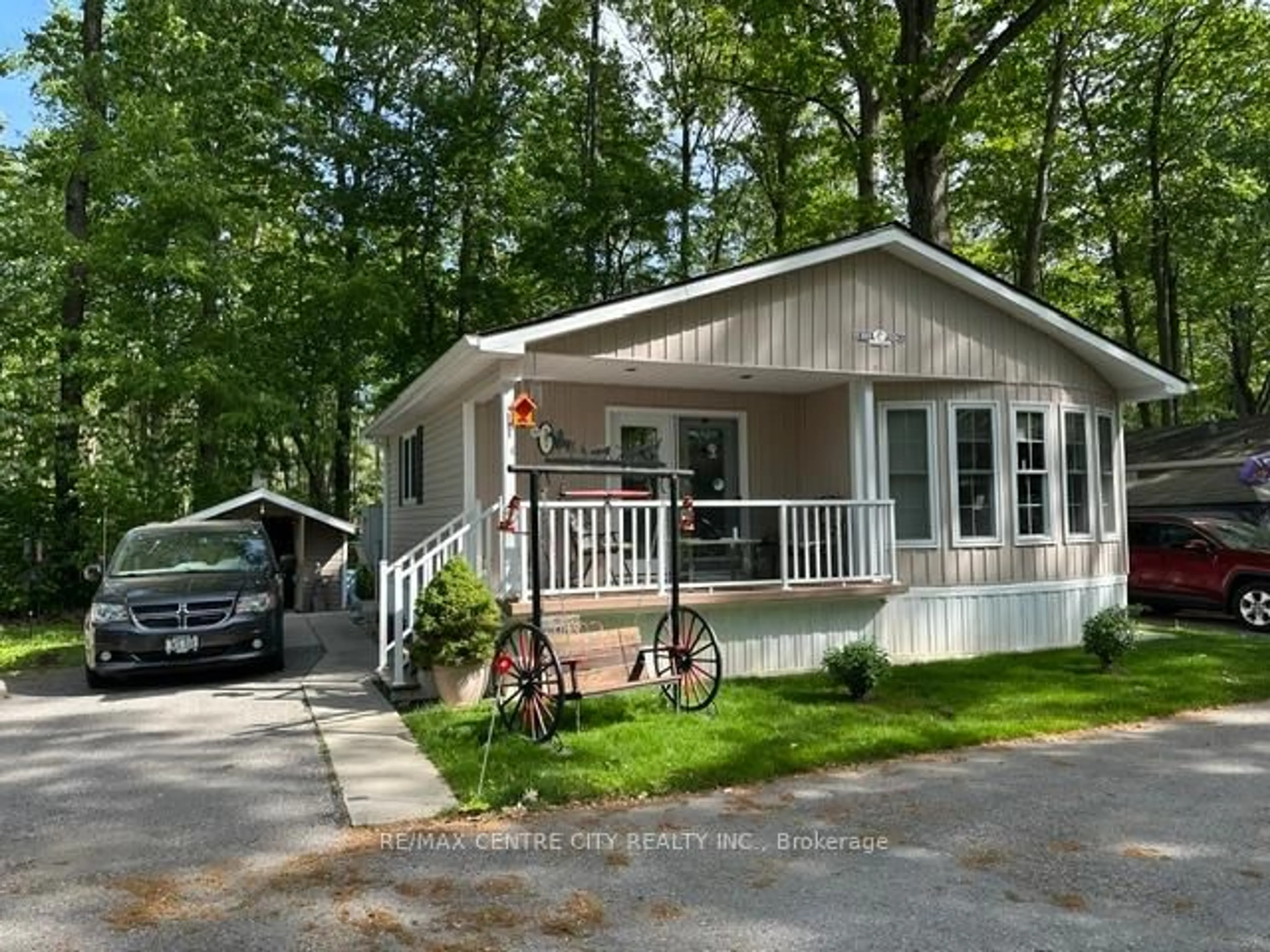 Home with vinyl exterior material, street for 22790 Amiens Rd #37, Middlesex Centre Ontario N0L 1R0