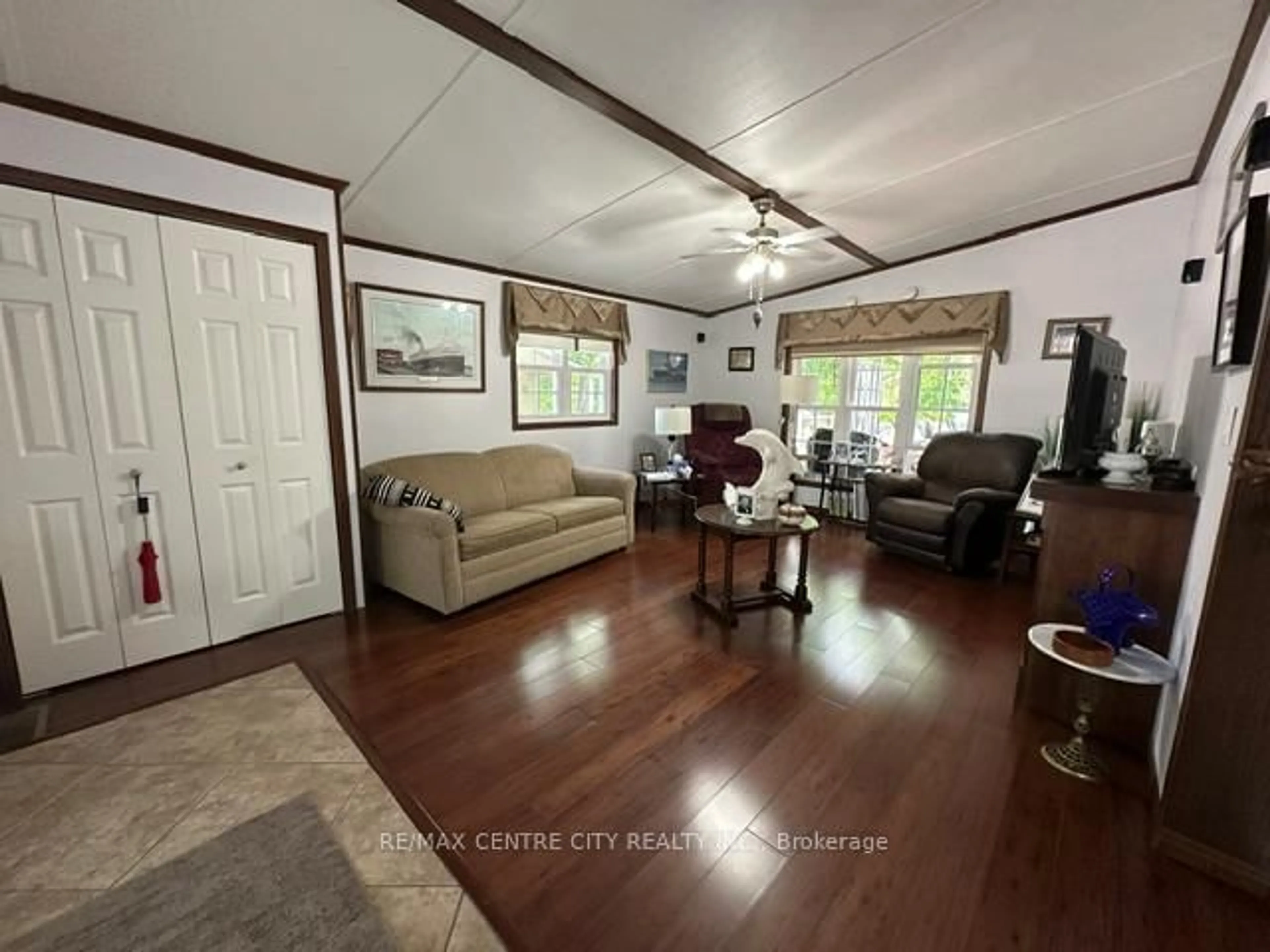 Living room with furniture, unknown for 22790 Amiens Rd #37, Middlesex Centre Ontario N0L 1R0