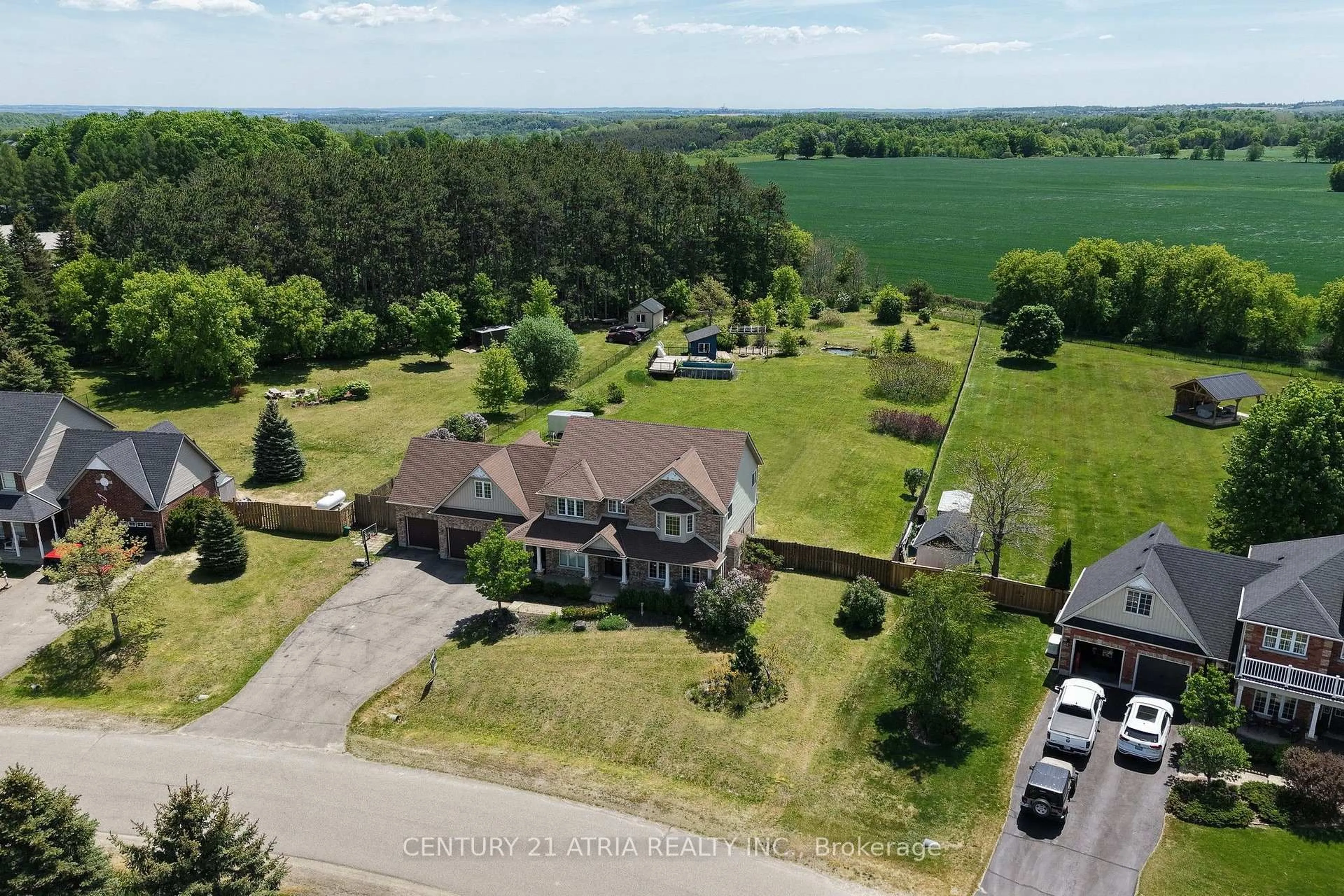 A pic from outside/outdoor area/front of a property/back of a property/a pic from drone, water/lake/river/ocean view for 11 Jeffery Dr, Mulmur Ontario L9V 3H7