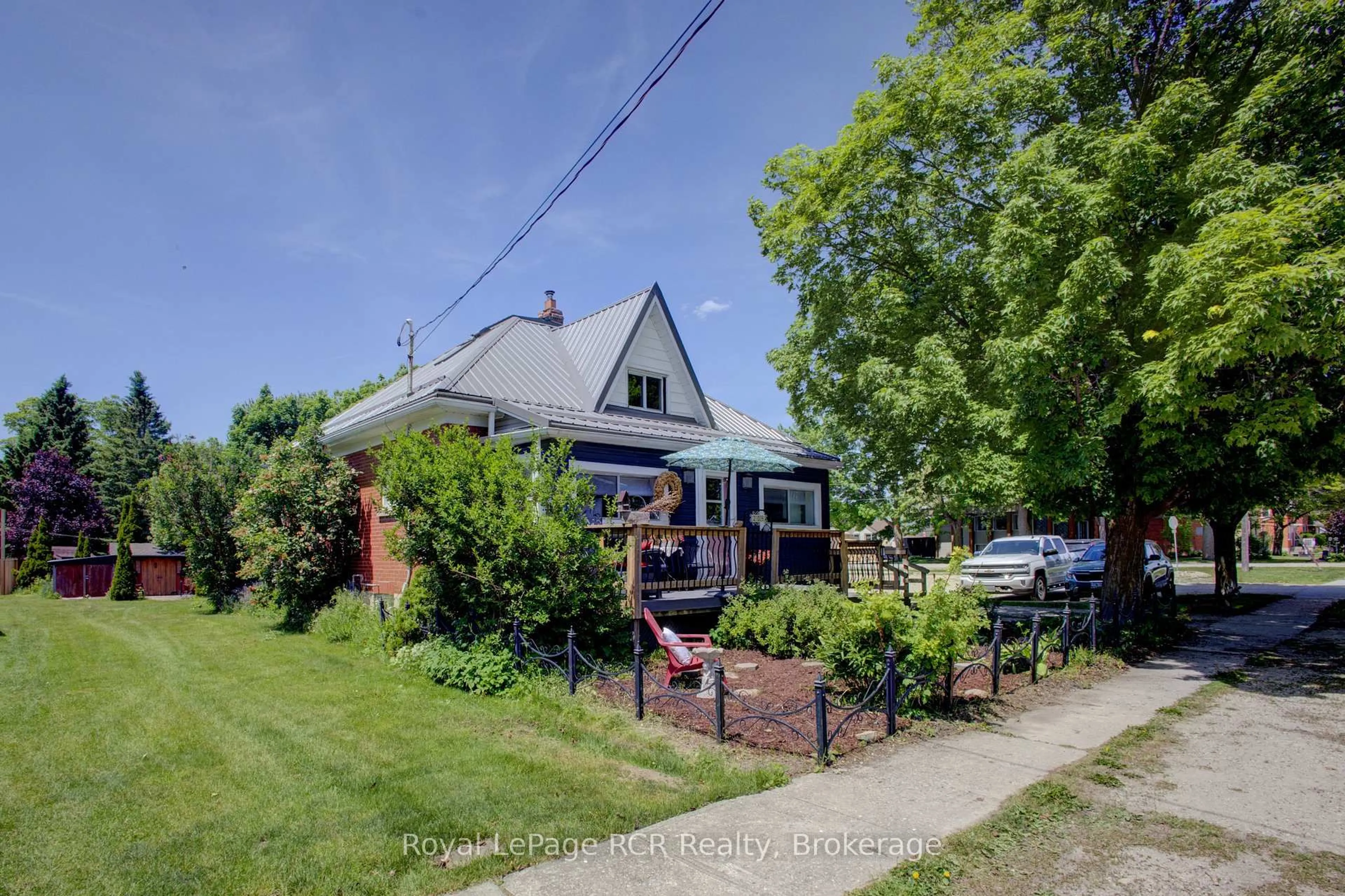 A pic from outside/outdoor area/front of a property/back of a property/a pic from drone, street for 204 King St, North Perth Ontario N0G 1B0