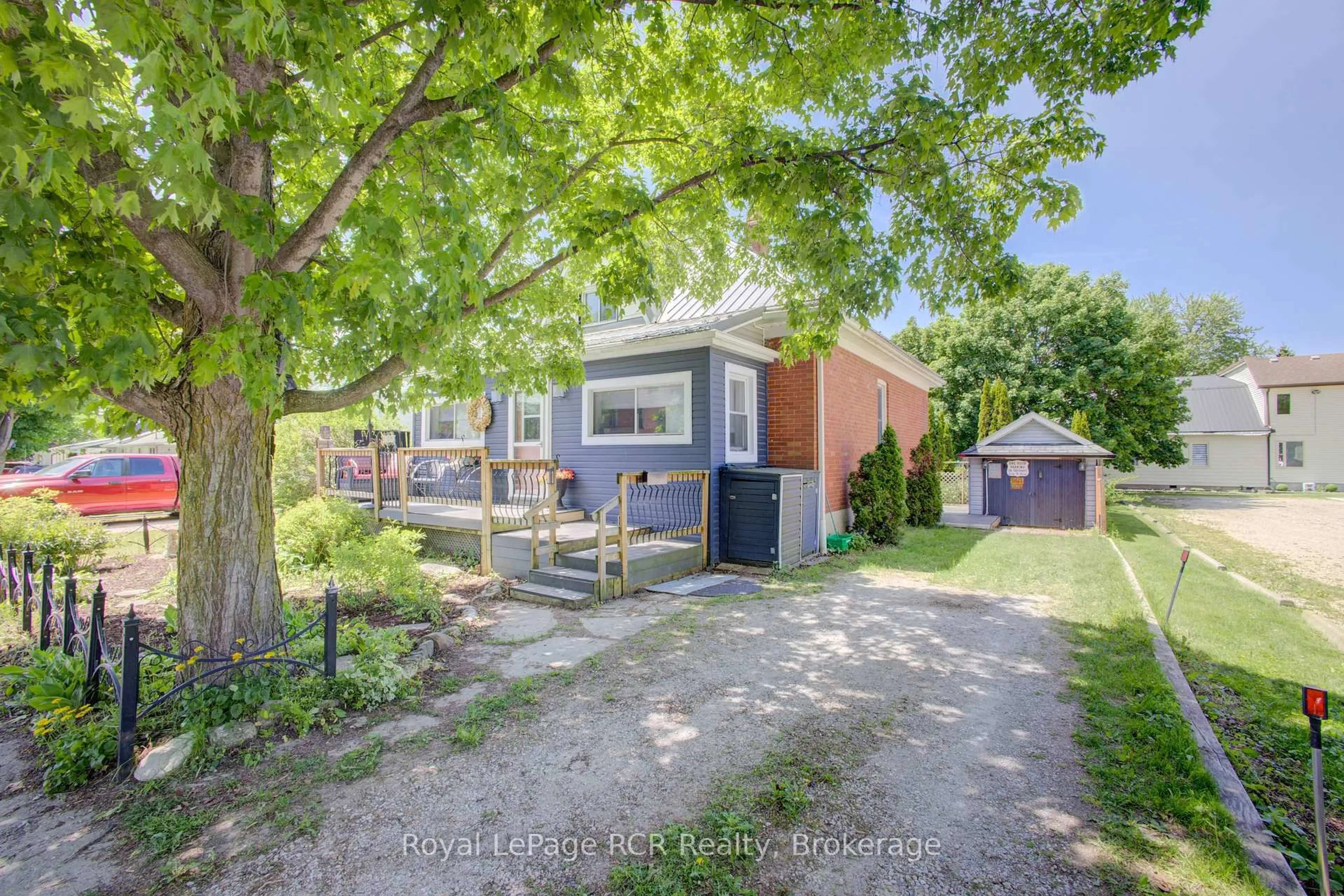 A pic from outside/outdoor area/front of a property/back of a property/a pic from drone, street for 204 King St, North Perth Ontario N0G 1B0