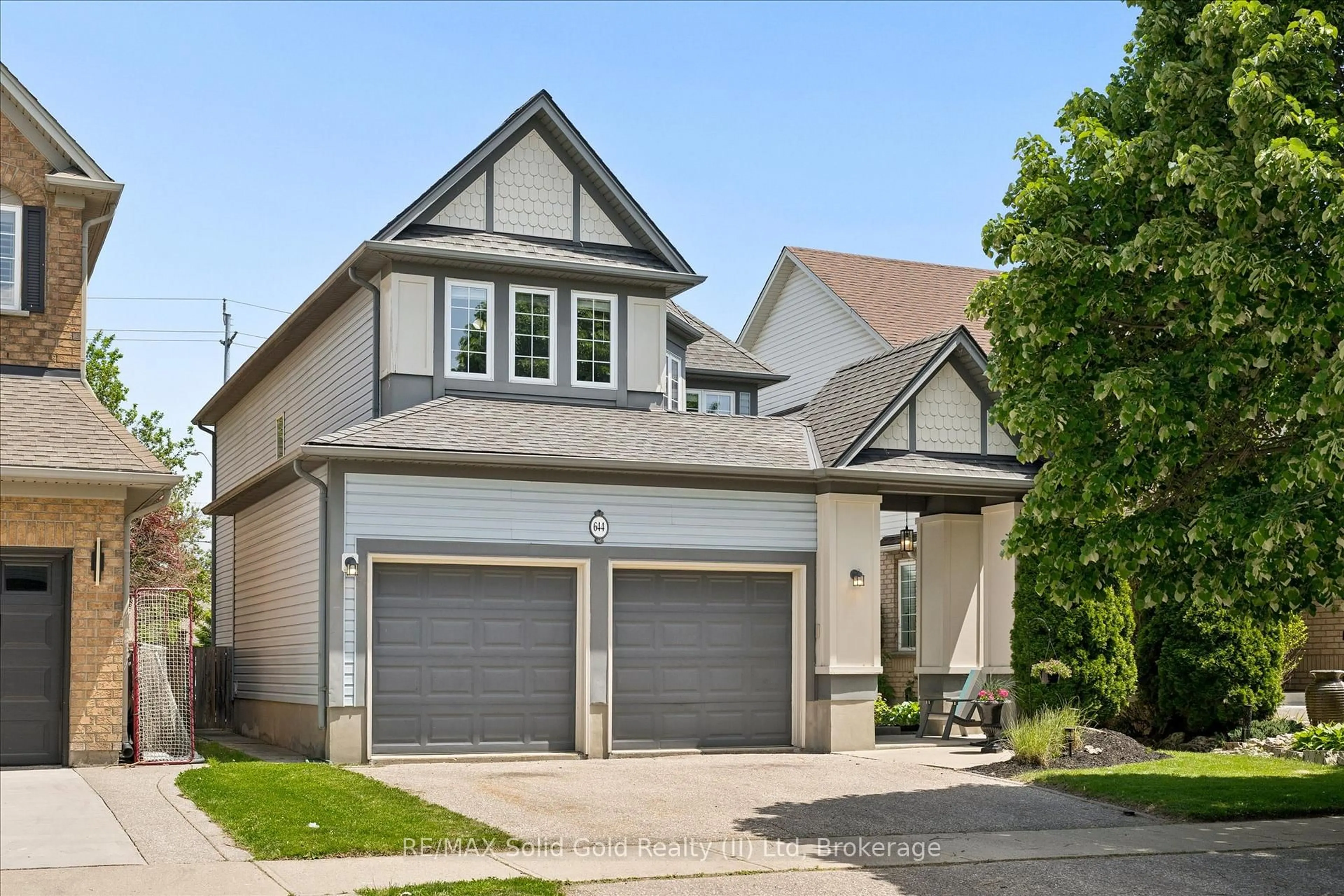 Home with vinyl exterior material, street for 644 Yarmouth Dr, Waterloo Ontario N2K 4C2