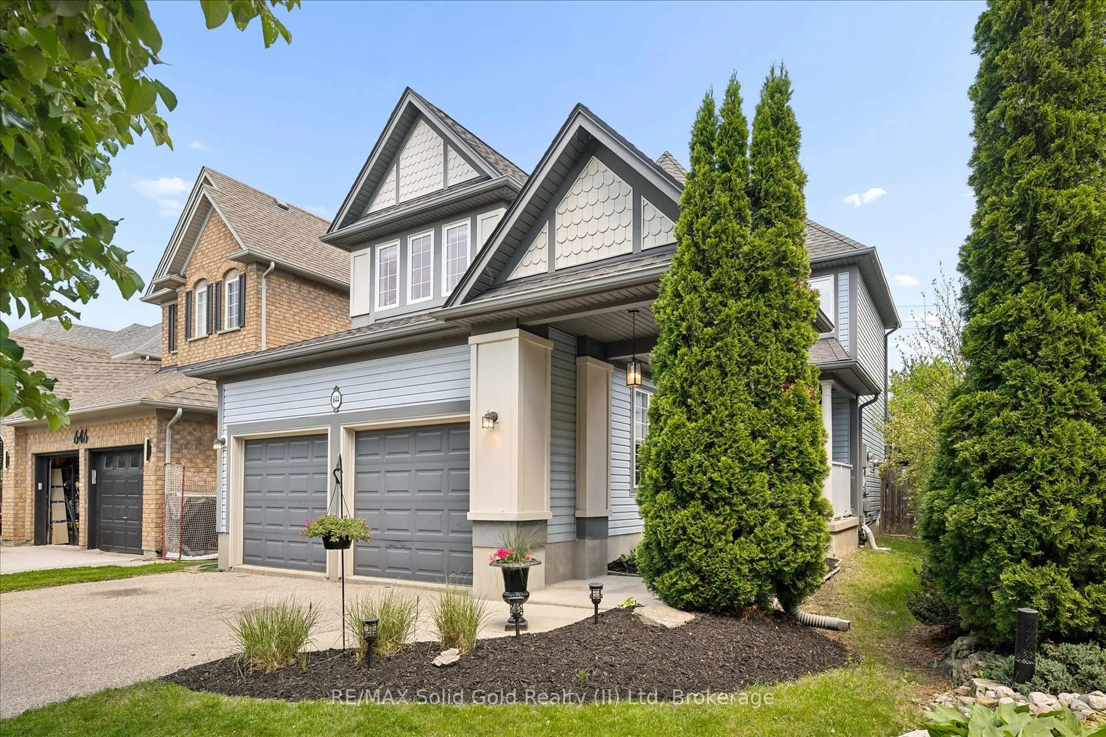 Home with vinyl exterior material, street for 644 Yarmouth Dr, Waterloo Ontario N2K 4C2