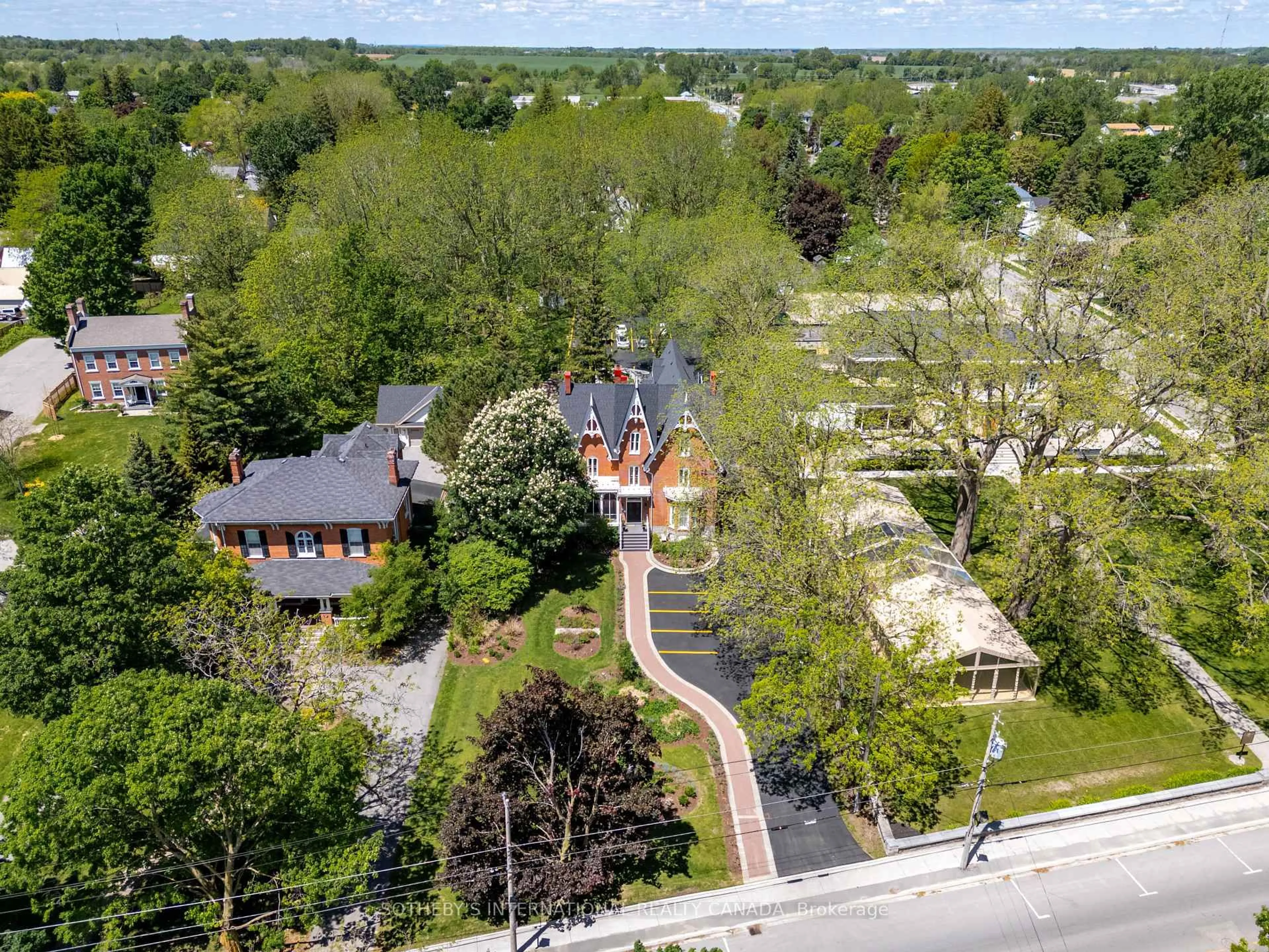 A pic from outside/outdoor area/front of a property/back of a property/a pic from drone, street for 343 Main St, Prince Edward County Ontario K0K 2T0