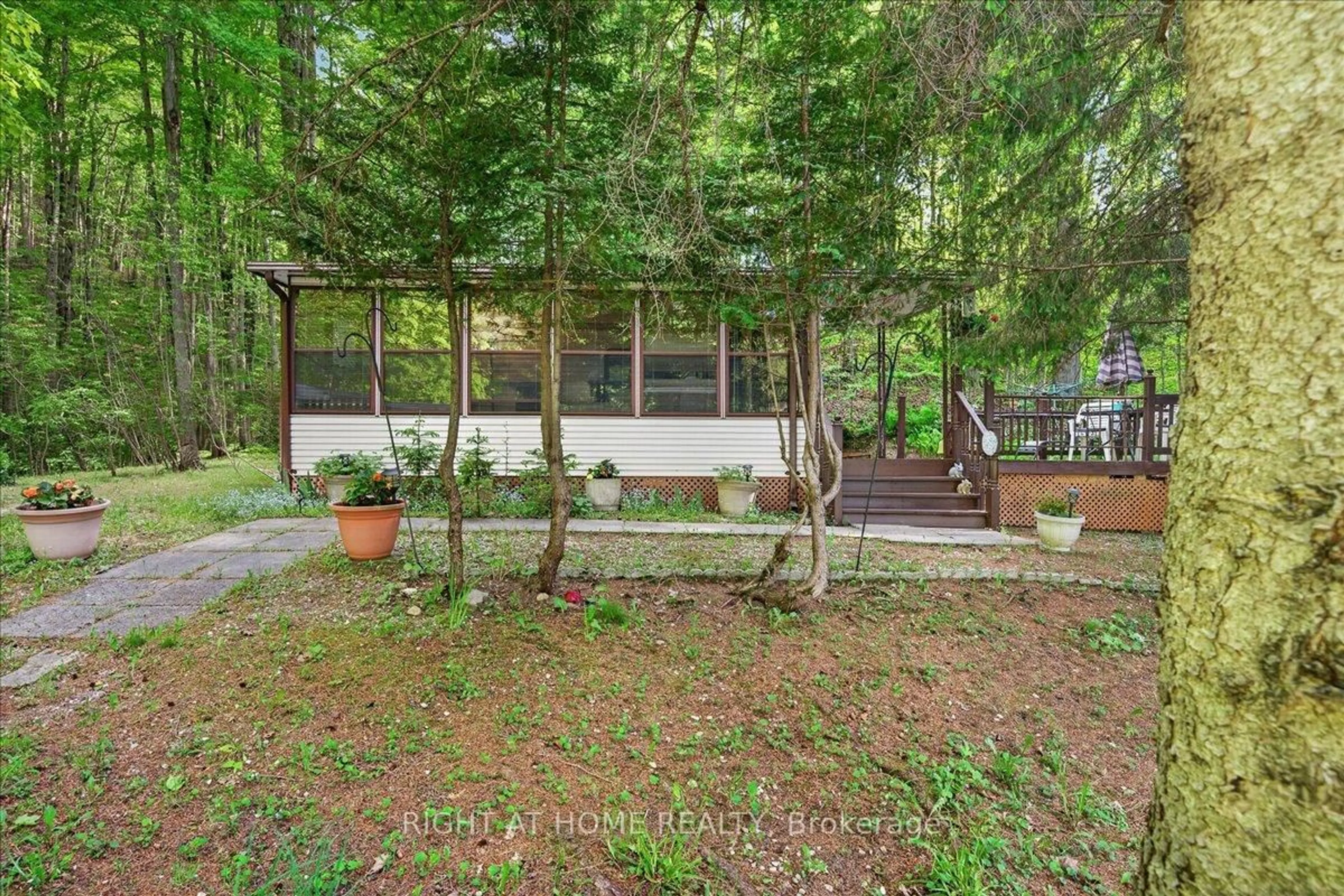 Patio, forest/trees view for 142571 35 Rd #201, West Grey Ontario N0G 1C0