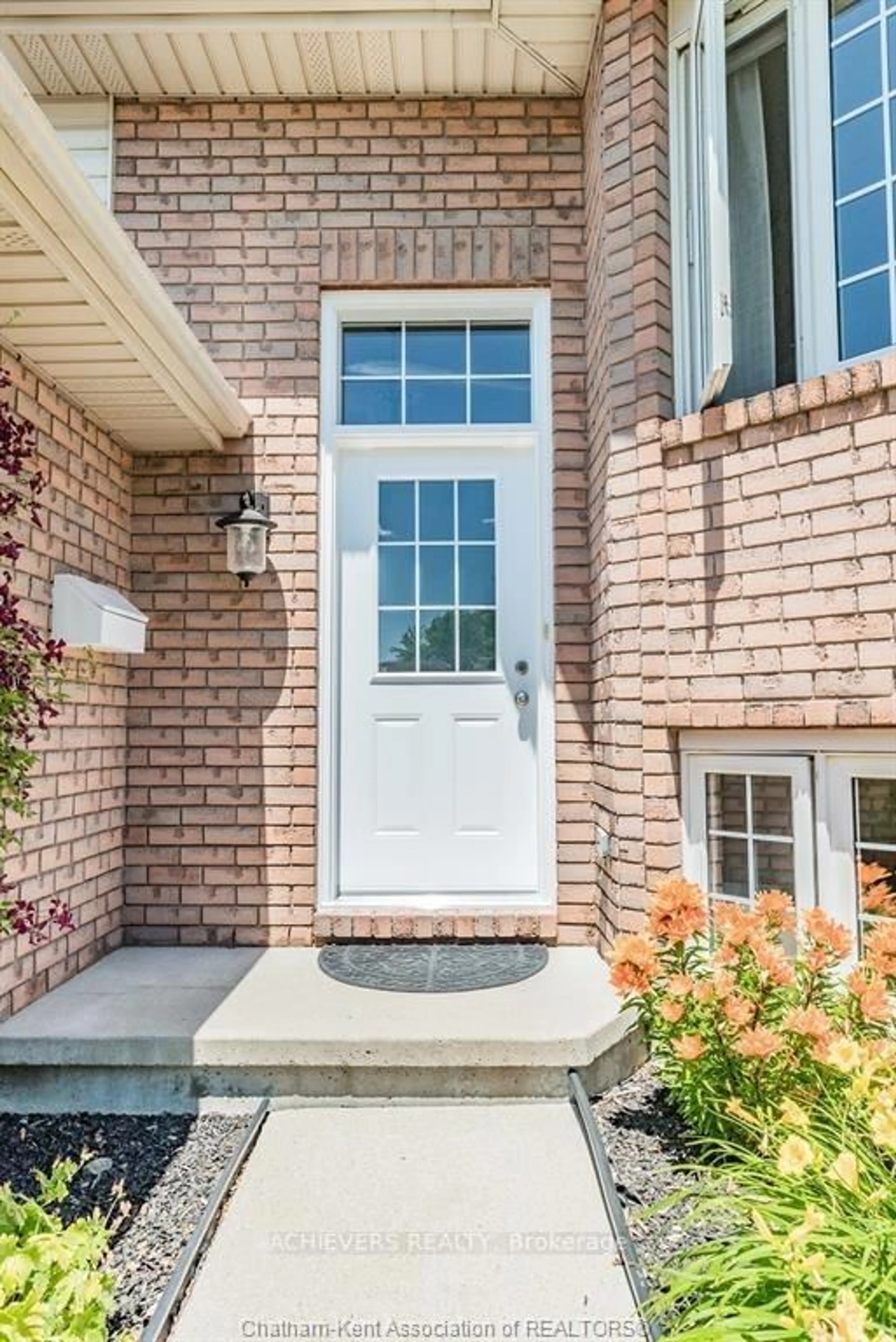Home with brick exterior material, street for 107 Greenfield Lane, Chatham-Kent Ontario N7L 5N5