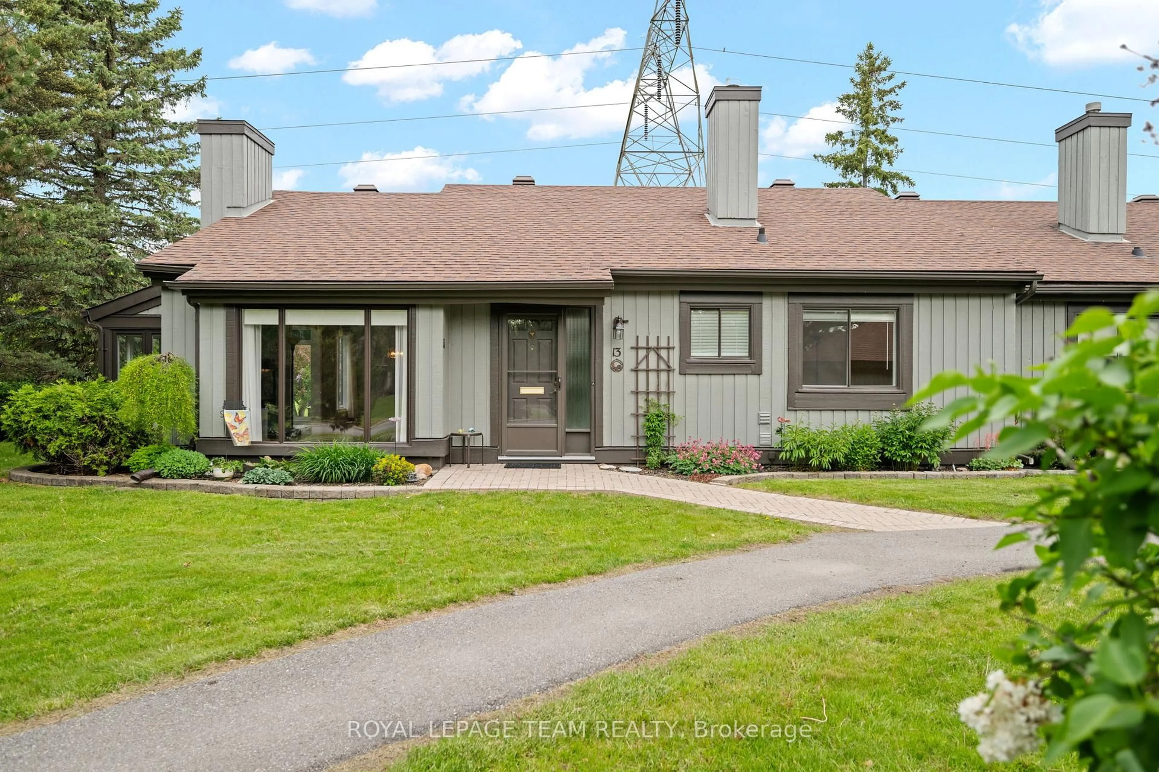 Home with vinyl exterior material, street for 13 Arbor Rdge, Ottawa Ontario K2S 1B9