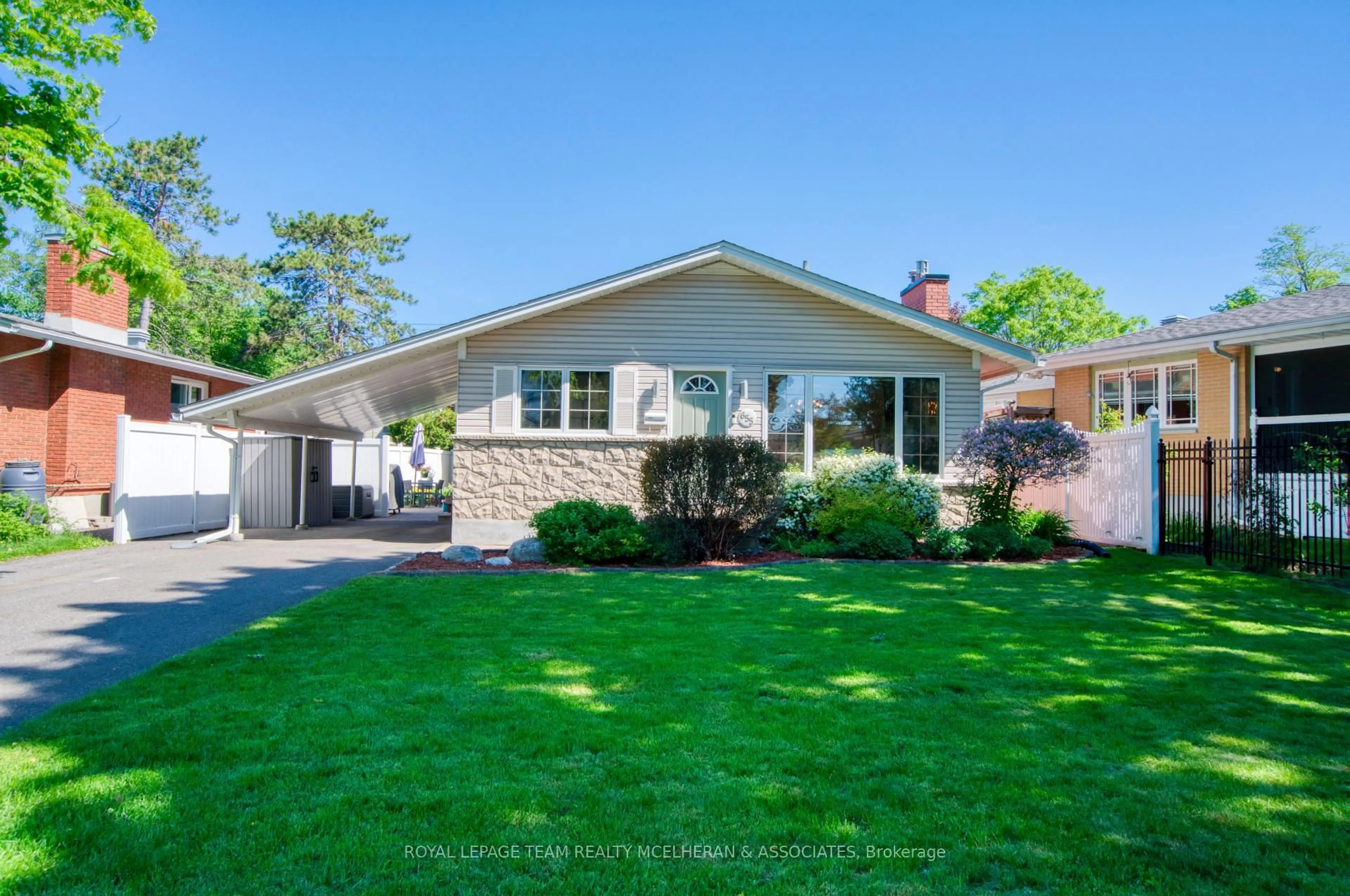 Home with vinyl exterior material, street for 655 Browning Ave, Ottawa Ontario K1G 0T8
