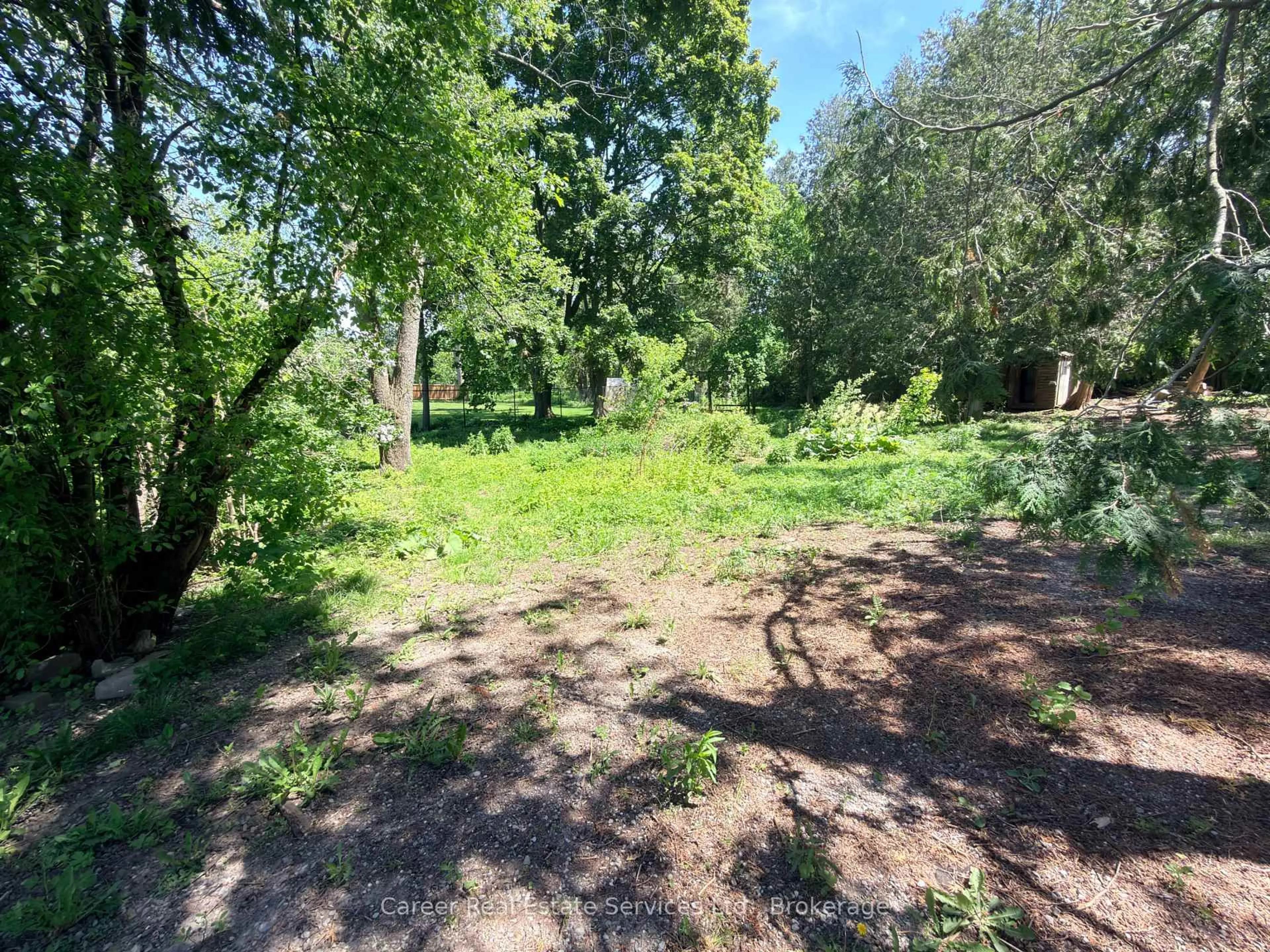 A pic from outside/outdoor area/front of a property/back of a property/a pic from drone, forest/trees view for 76 Springbrook Dr, Peterborough Ontario K9J 1L1