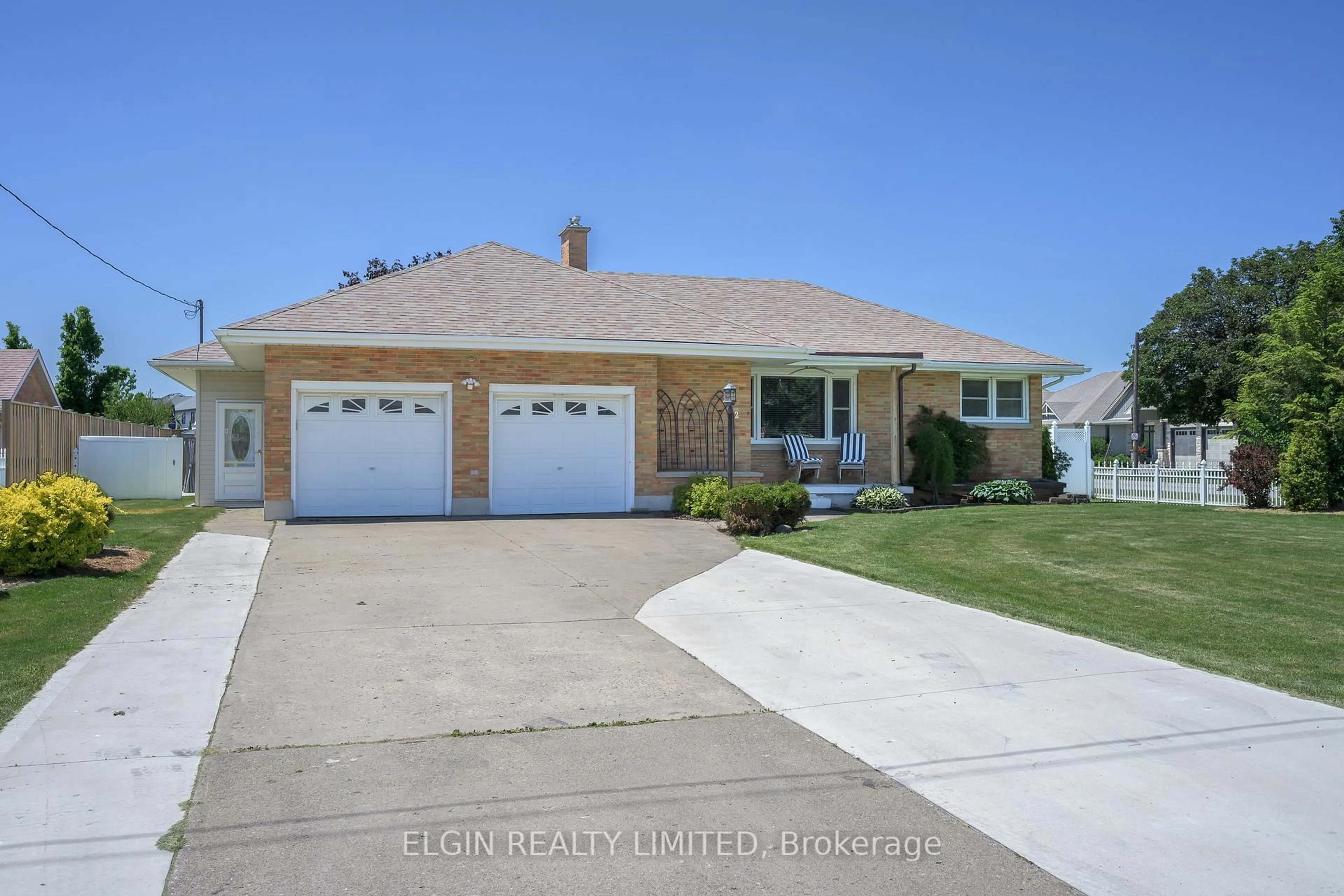 Home with vinyl exterior material, street for 2 Lyndale Ave, Central Elgin Ontario N5R 1C4