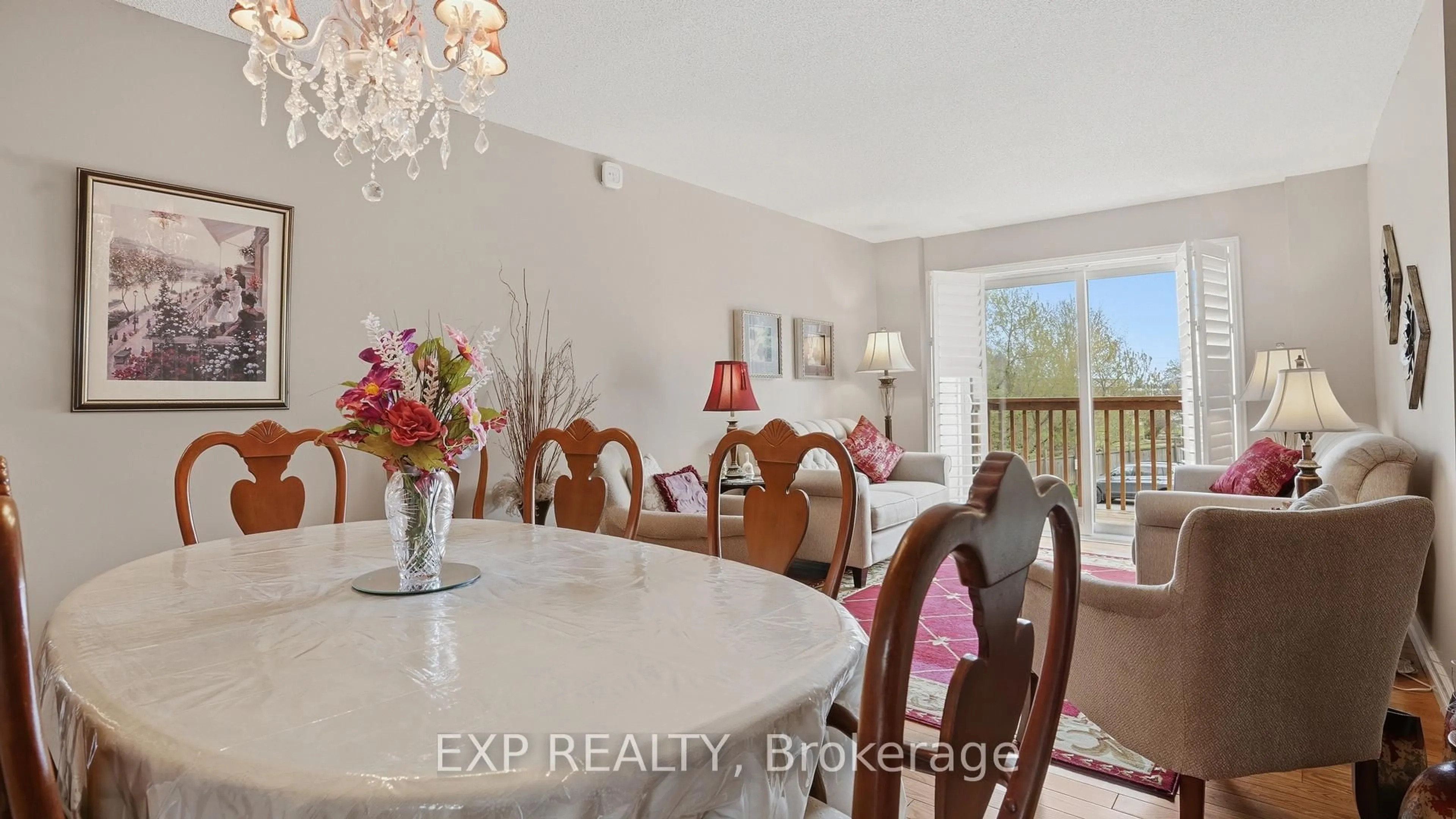 Dining room, wood/laminate floor for 178 Scott St #14, St. Catharines Ontario L2N 6Y5