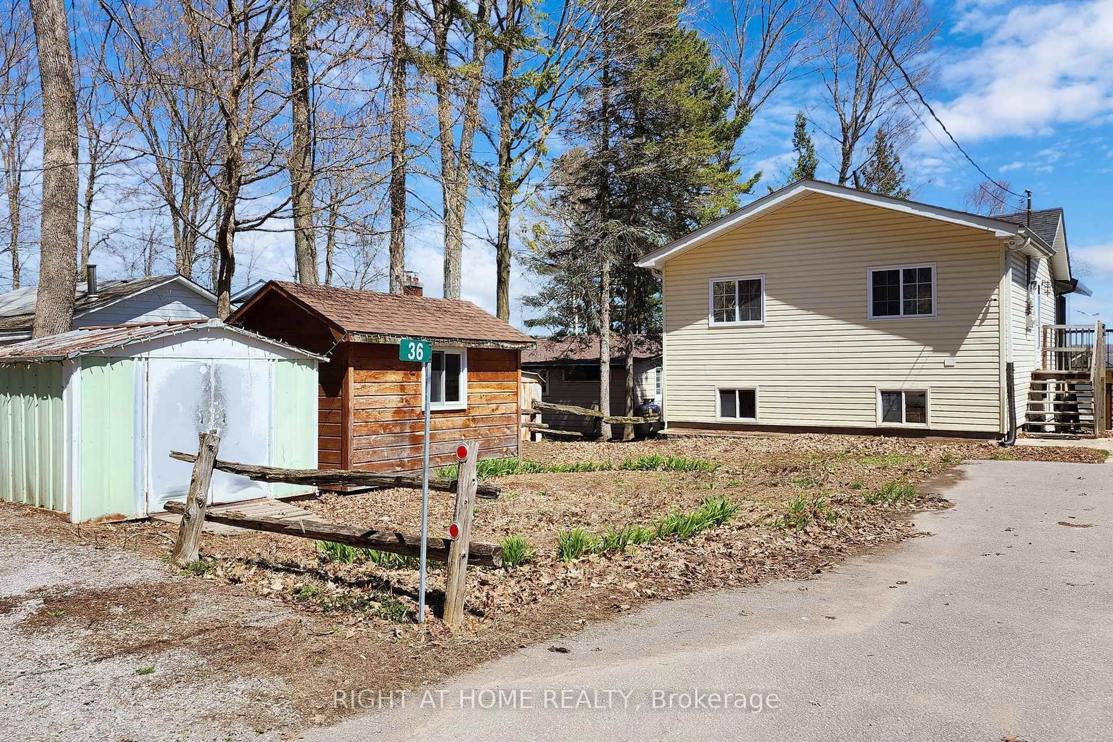 A pic from outside/outdoor area/front of a property/back of a property/a pic from drone, street for 36 Hills Rd, Kawartha Lakes Ontario K0M 1A0